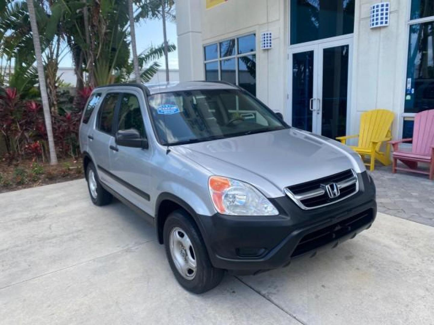 2004 Satin Silver Metallic /Black Honda CR-V LX LOW MILES 44,323 (SHSRD684X4U) with an 2.4L DOHC PGM-FI 16-Valve i-VTEC I4 Engine engine, Automatic transmission, located at 4701 North Dixie Hwy, Pompano Beach, FL, 33064, (954) 422-2889, 26.240938, -80.123474 - OUR WEBPAGE FLORIDACARS1.COM HAS OVER 100 PHOTOS AND FREE CARFAX LINK 2004 HONDA CR-V LX VIN: SHSRD684X4U202379 S H S R D 6 8 4 X 4 U 2 0 2 3 7 9 4 DOOR WAGON/SPORT UTILITY 2.4L I4 F SOHC GASOLINE 29 MPG FRONT WHEEL DRIVE Top Features Leatherette and Cloth Basic Features AM/FM Stereo CD Audio Powe - Photo#1