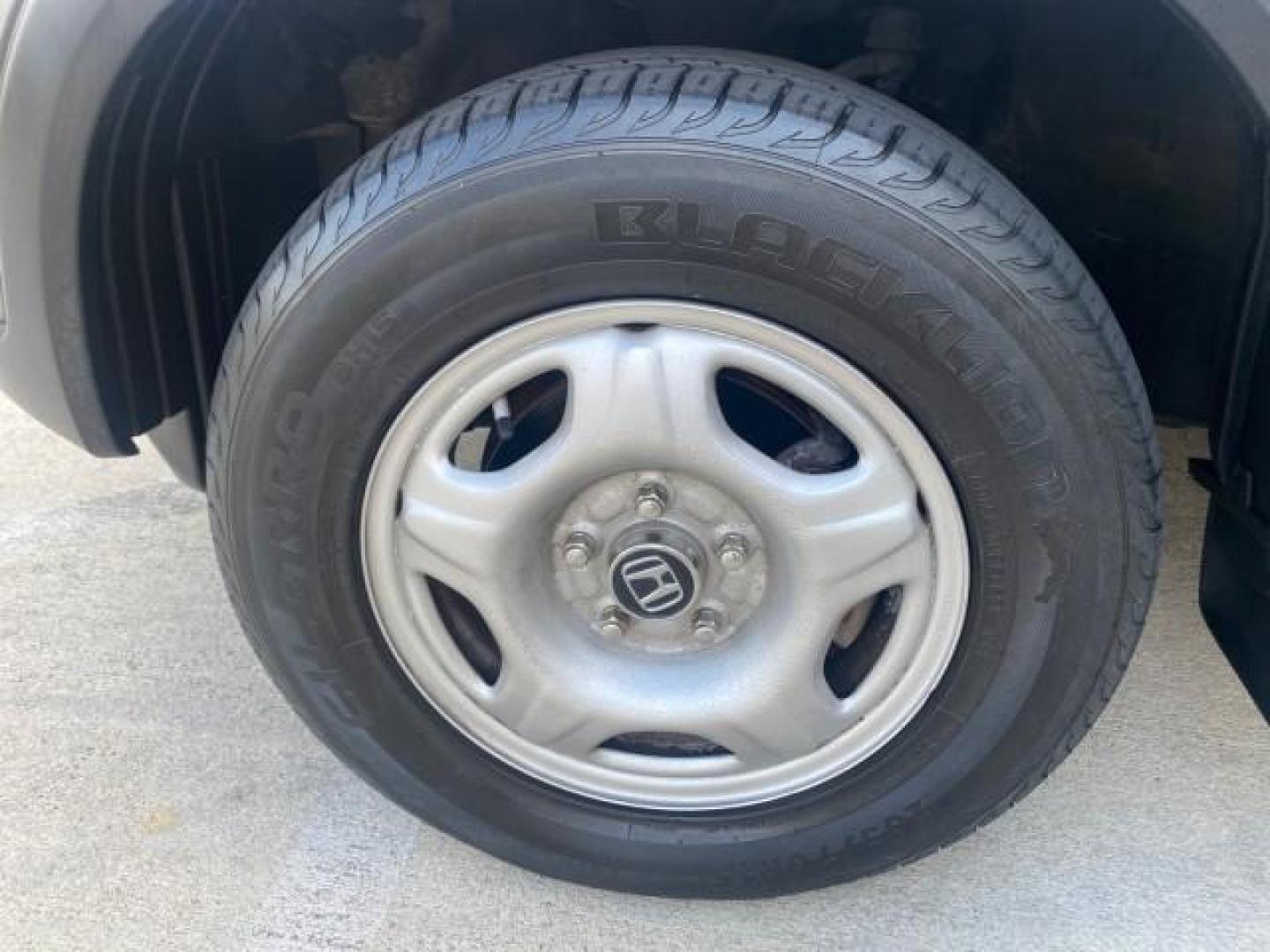 2004 Satin Silver Metallic /Black Honda CR-V LX LOW MILES 44,323 (SHSRD684X4U) with an 2.4L DOHC PGM-FI 16-Valve i-VTEC I4 Engine engine, Automatic transmission, located at 4701 North Dixie Hwy, Pompano Beach, FL, 33064, (954) 422-2889, 26.240938, -80.123474 - OUR WEBPAGE FLORIDACARS1.COM HAS OVER 100 PHOTOS AND FREE CARFAX LINK 2004 HONDA CR-V LX VIN: SHSRD684X4U202379 S H S R D 6 8 4 X 4 U 2 0 2 3 7 9 4 DOOR WAGON/SPORT UTILITY 2.4L I4 F SOHC GASOLINE 29 MPG FRONT WHEEL DRIVE Top Features Leatherette and Cloth Basic Features AM/FM Stereo CD Audio Powe - Photo#19