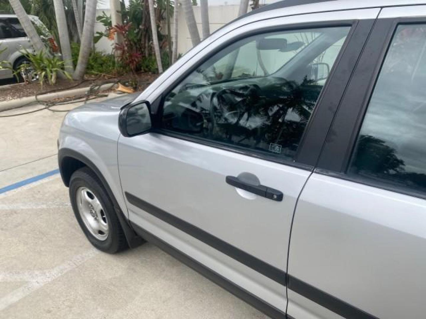 2004 Satin Silver Metallic /Black Honda CR-V LX LOW MILES 44,323 (SHSRD684X4U) with an 2.4L DOHC PGM-FI 16-Valve i-VTEC I4 Engine engine, Automatic transmission, located at 4701 North Dixie Hwy, Pompano Beach, FL, 33064, (954) 422-2889, 26.240938, -80.123474 - OUR WEBPAGE FLORIDACARS1.COM HAS OVER 100 PHOTOS AND FREE CARFAX LINK 2004 HONDA CR-V LX VIN: SHSRD684X4U202379 S H S R D 6 8 4 X 4 U 2 0 2 3 7 9 4 DOOR WAGON/SPORT UTILITY 2.4L I4 F SOHC GASOLINE 29 MPG FRONT WHEEL DRIVE Top Features Leatherette and Cloth Basic Features AM/FM Stereo CD Audio Powe - Photo#26