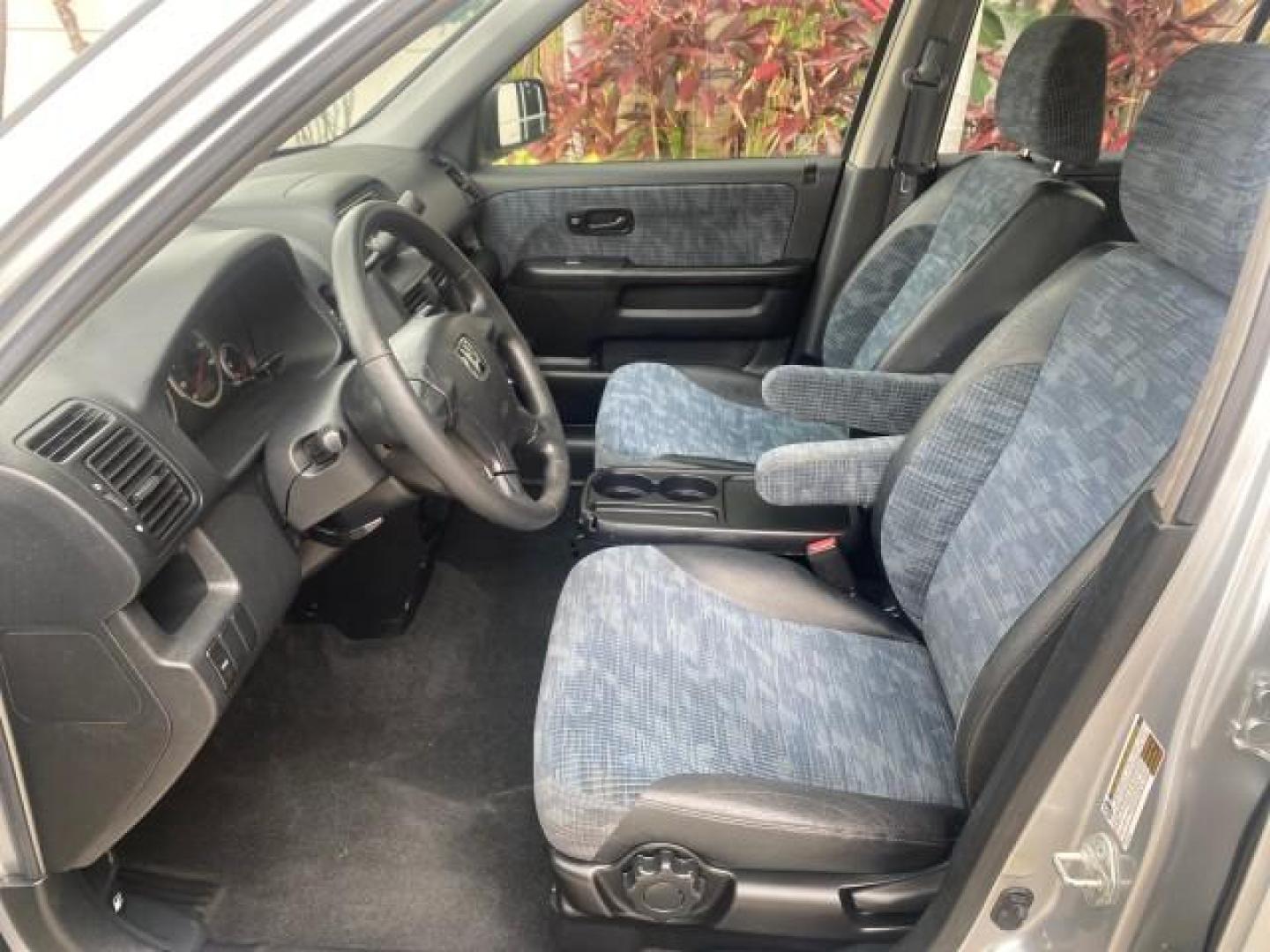 2004 Satin Silver Metallic /Black Honda CR-V LX LOW MILES 44,323 (SHSRD684X4U) with an 2.4L DOHC PGM-FI 16-Valve i-VTEC I4 Engine engine, Automatic transmission, located at 4701 North Dixie Hwy, Pompano Beach, FL, 33064, (954) 422-2889, 26.240938, -80.123474 - OUR WEBPAGE FLORIDACARS1.COM HAS OVER 100 PHOTOS AND FREE CARFAX LINK 2004 HONDA CR-V LX VIN: SHSRD684X4U202379 S H S R D 6 8 4 X 4 U 2 0 2 3 7 9 4 DOOR WAGON/SPORT UTILITY 2.4L I4 F SOHC GASOLINE 29 MPG FRONT WHEEL DRIVE Top Features Leatherette and Cloth Basic Features AM/FM Stereo CD Audio Powe - Photo#31
