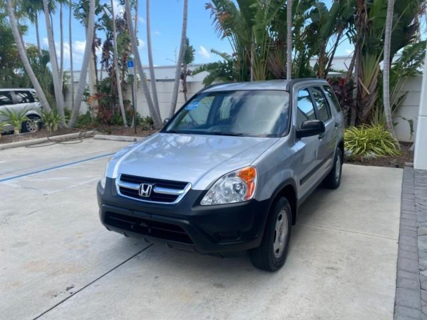 2004 Satin Silver Metallic /Black Honda CR-V LX LOW MILES 44,323 (SHSRD684X4U) with an 2.4L DOHC PGM-FI 16-Valve i-VTEC I4 Engine engine, Automatic transmission, located at 4701 North Dixie Hwy, Pompano Beach, FL, 33064, (954) 422-2889, 26.240938, -80.123474 - OUR WEBPAGE FLORIDACARS1.COM HAS OVER 100 PHOTOS AND FREE CARFAX LINK 2004 HONDA CR-V LX VIN: SHSRD684X4U202379 S H S R D 6 8 4 X 4 U 2 0 2 3 7 9 4 DOOR WAGON/SPORT UTILITY 2.4L I4 F SOHC GASOLINE 29 MPG FRONT WHEEL DRIVE Top Features Leatherette and Cloth Basic Features AM/FM Stereo CD Audio Powe - Photo#3