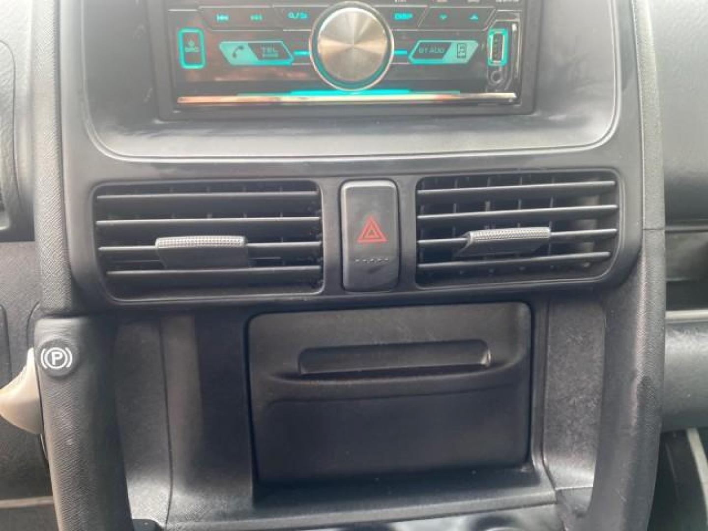 2004 Satin Silver Metallic /Black Honda CR-V LX LOW MILES 44,323 (SHSRD684X4U) with an 2.4L DOHC PGM-FI 16-Valve i-VTEC I4 Engine engine, Automatic transmission, located at 4701 North Dixie Hwy, Pompano Beach, FL, 33064, (954) 422-2889, 26.240938, -80.123474 - OUR WEBPAGE FLORIDACARS1.COM HAS OVER 100 PHOTOS AND FREE CARFAX LINK 2004 HONDA CR-V LX VIN: SHSRD684X4U202379 S H S R D 6 8 4 X 4 U 2 0 2 3 7 9 4 DOOR WAGON/SPORT UTILITY 2.4L I4 F SOHC GASOLINE 29 MPG FRONT WHEEL DRIVE Top Features Leatherette and Cloth Basic Features AM/FM Stereo CD Audio Powe - Photo#43