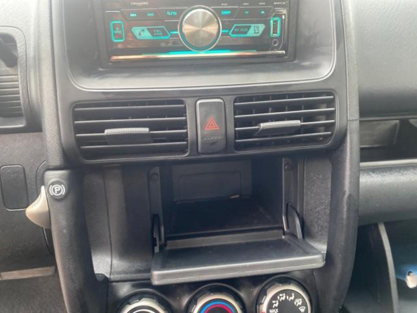 2004 Satin Silver Metallic /Black Honda CR-V LX LOW MILES 44,323 (SHSRD684X4U) with an 2.4L DOHC PGM-FI 16-Valve i-VTEC I4 Engine engine, Automatic transmission, located at 4701 North Dixie Hwy, Pompano Beach, FL, 33064, (954) 422-2889, 26.240938, -80.123474 - OUR WEBPAGE FLORIDACARS1.COM HAS OVER 100 PHOTOS AND FREE CARFAX LINK 2004 HONDA CR-V LX VIN: SHSRD684X4U202379 S H S R D 6 8 4 X 4 U 2 0 2 3 7 9 4 DOOR WAGON/SPORT UTILITY 2.4L I4 F SOHC GASOLINE 29 MPG FRONT WHEEL DRIVE Top Features Leatherette and Cloth Basic Features AM/FM Stereo CD Audio Powe - Photo#44
