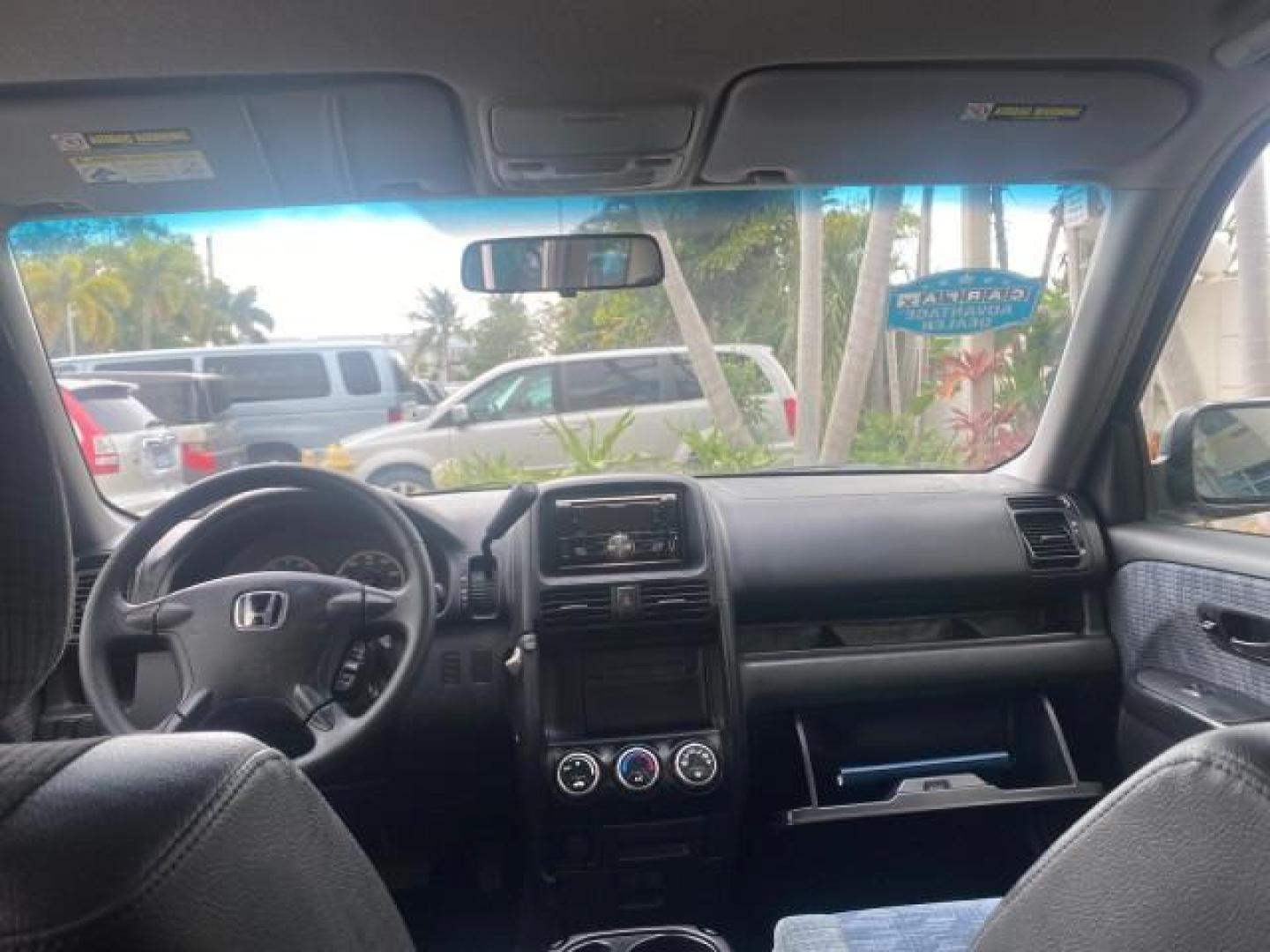 2004 Satin Silver Metallic /Black Honda CR-V LX LOW MILES 44,323 (SHSRD684X4U) with an 2.4L DOHC PGM-FI 16-Valve i-VTEC I4 Engine engine, Automatic transmission, located at 4701 North Dixie Hwy, Pompano Beach, FL, 33064, (954) 422-2889, 26.240938, -80.123474 - OUR WEBPAGE FLORIDACARS1.COM HAS OVER 100 PHOTOS AND FREE CARFAX LINK 2004 HONDA CR-V LX VIN: SHSRD684X4U202379 S H S R D 6 8 4 X 4 U 2 0 2 3 7 9 4 DOOR WAGON/SPORT UTILITY 2.4L I4 F SOHC GASOLINE 29 MPG FRONT WHEEL DRIVE Top Features Leatherette and Cloth Basic Features AM/FM Stereo CD Audio Powe - Photo#65
