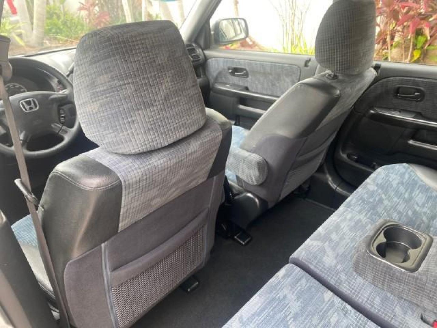 2004 Satin Silver Metallic /Black Honda CR-V LX LOW MILES 44,323 (SHSRD684X4U) with an 2.4L DOHC PGM-FI 16-Valve i-VTEC I4 Engine engine, Automatic transmission, located at 4701 North Dixie Hwy, Pompano Beach, FL, 33064, (954) 422-2889, 26.240938, -80.123474 - OUR WEBPAGE FLORIDACARS1.COM HAS OVER 100 PHOTOS AND FREE CARFAX LINK 2004 HONDA CR-V LX VIN: SHSRD684X4U202379 S H S R D 6 8 4 X 4 U 2 0 2 3 7 9 4 DOOR WAGON/SPORT UTILITY 2.4L I4 F SOHC GASOLINE 29 MPG FRONT WHEEL DRIVE Top Features Leatherette and Cloth Basic Features AM/FM Stereo CD Audio Powe - Photo#67