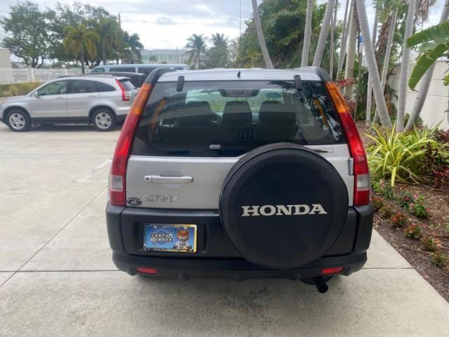 2004 Satin Silver Metallic /Black Honda CR-V LX LOW MILES 44,323 (SHSRD684X4U) with an 2.4L DOHC PGM-FI 16-Valve i-VTEC I4 Engine engine, Automatic transmission, located at 4701 North Dixie Hwy, Pompano Beach, FL, 33064, (954) 422-2889, 26.240938, -80.123474 - OUR WEBPAGE FLORIDACARS1.COM HAS OVER 100 PHOTOS AND FREE CARFAX LINK 2004 HONDA CR-V LX VIN: SHSRD684X4U202379 S H S R D 6 8 4 X 4 U 2 0 2 3 7 9 4 DOOR WAGON/SPORT UTILITY 2.4L I4 F SOHC GASOLINE 29 MPG FRONT WHEEL DRIVE Top Features Leatherette and Cloth Basic Features AM/FM Stereo CD Audio Powe - Photo#73