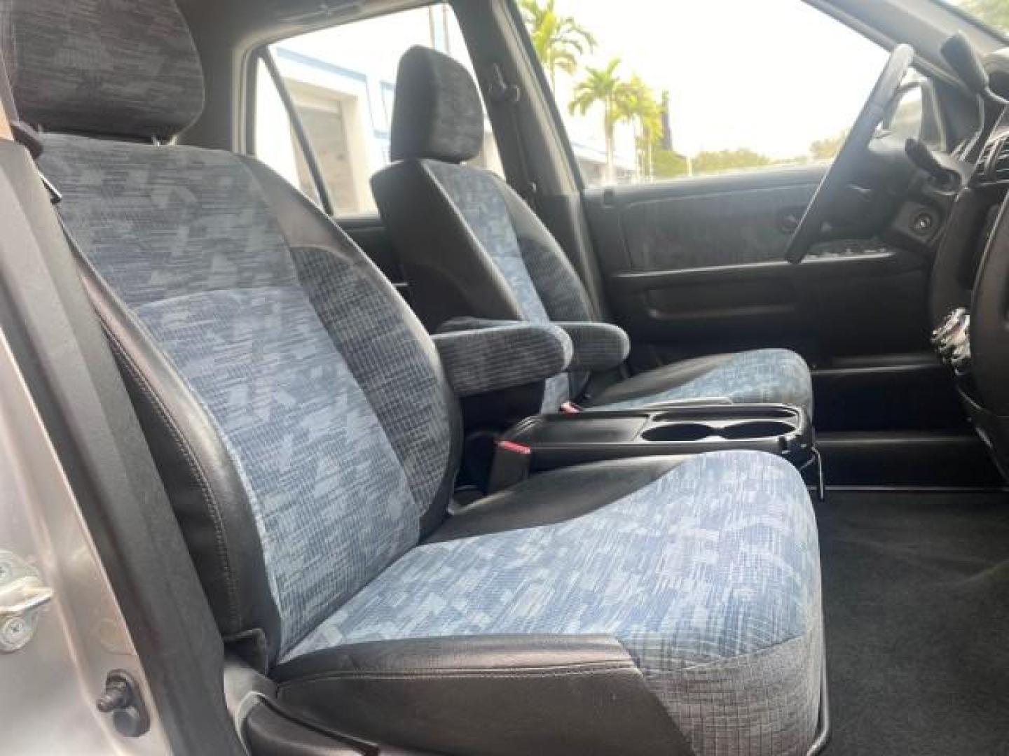 2004 Satin Silver Metallic /Black Honda CR-V LX LOW MILES 44,323 (SHSRD684X4U) with an 2.4L DOHC PGM-FI 16-Valve i-VTEC I4 Engine engine, Automatic transmission, located at 4701 North Dixie Hwy, Pompano Beach, FL, 33064, (954) 422-2889, 26.240938, -80.123474 - OUR WEBPAGE FLORIDACARS1.COM HAS OVER 100 PHOTOS AND FREE CARFAX LINK 2004 HONDA CR-V LX VIN: SHSRD684X4U202379 S H S R D 6 8 4 X 4 U 2 0 2 3 7 9 4 DOOR WAGON/SPORT UTILITY 2.4L I4 F SOHC GASOLINE 29 MPG FRONT WHEEL DRIVE Top Features Leatherette and Cloth Basic Features AM/FM Stereo CD Audio Powe - Photo#97