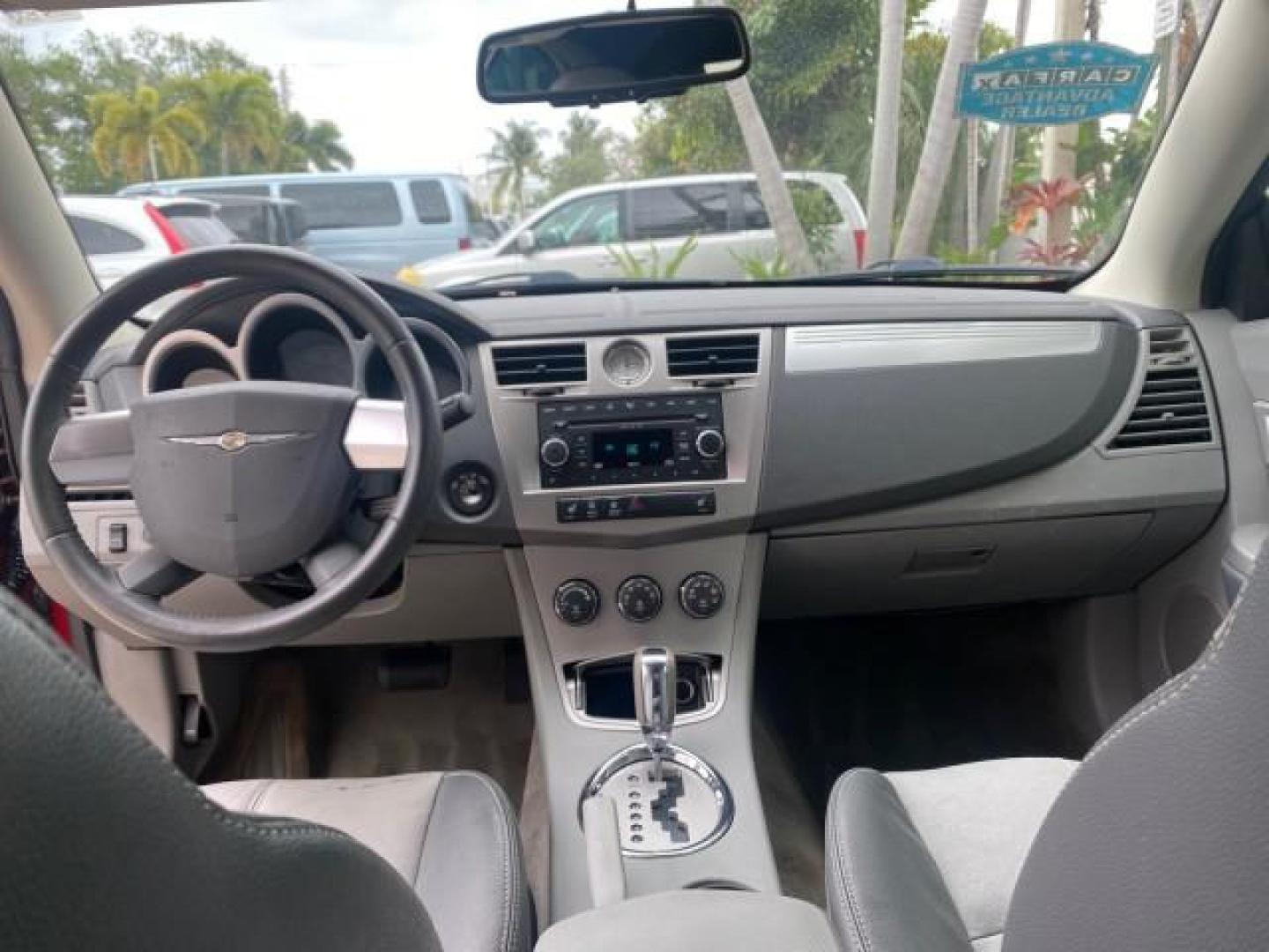 2008 Inferno Red Crystal /Dark/Light Slate Gray Chrysler Sebring FLORIDA 41 SERVICES CONVERTIBLE (1C3LC55R48N) with an 2.7L V6 Cylinder Engine engine, Automatic transmission, located at 4701 North Dixie Hwy, Pompano Beach, FL, 33064, (954) 422-2889, 26.240938, -80.123474 - OUR WEBPAGE FLORIDACARS1.COM HAS OVER 100 PHOTOS AND FREE CARFAX LINK 2008 CHRYSLER SEBRING TOURING VIN: 1C3LC55R48N657900 1 C 3 L C 5 5 R 4 8 N 6 5 7 9 0 0 CONVERTIBLE 2.7L V6 F DOHC 24V GASOLINE FRONT WHEEL DRIVE Top Features Alloy Wheels Satellite Radio Ready 2 Tone Leather Seats Soft Top Front S - Photo#61