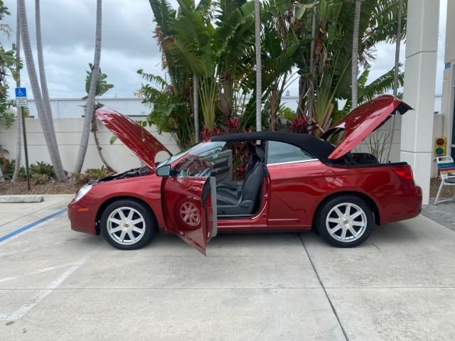 2008 Inferno Red Crystal /Dark/Light Slate Gray Chrysler Sebring FLORIDA 41 SERVICES CONVERTIBLE (1C3LC55R48N) with an 2.7L V6 Cylinder Engine engine, Automatic transmission, located at 4701 North Dixie Hwy, Pompano Beach, FL, 33064, (954) 422-2889, 26.240938, -80.123474 - OUR WEBPAGE FLORIDACARS1.COM HAS OVER 100 PHOTOS AND FREE CARFAX LINK 2008 CHRYSLER SEBRING TOURING VIN: 1C3LC55R48N657900 1 C 3 L C 5 5 R 4 8 N 6 5 7 9 0 0 CONVERTIBLE 2.7L V6 F DOHC 24V GASOLINE FRONT WHEEL DRIVE Top Features Alloy Wheels Satellite Radio Ready 2 Tone Leather Seats Soft Top Front S - Photo#8