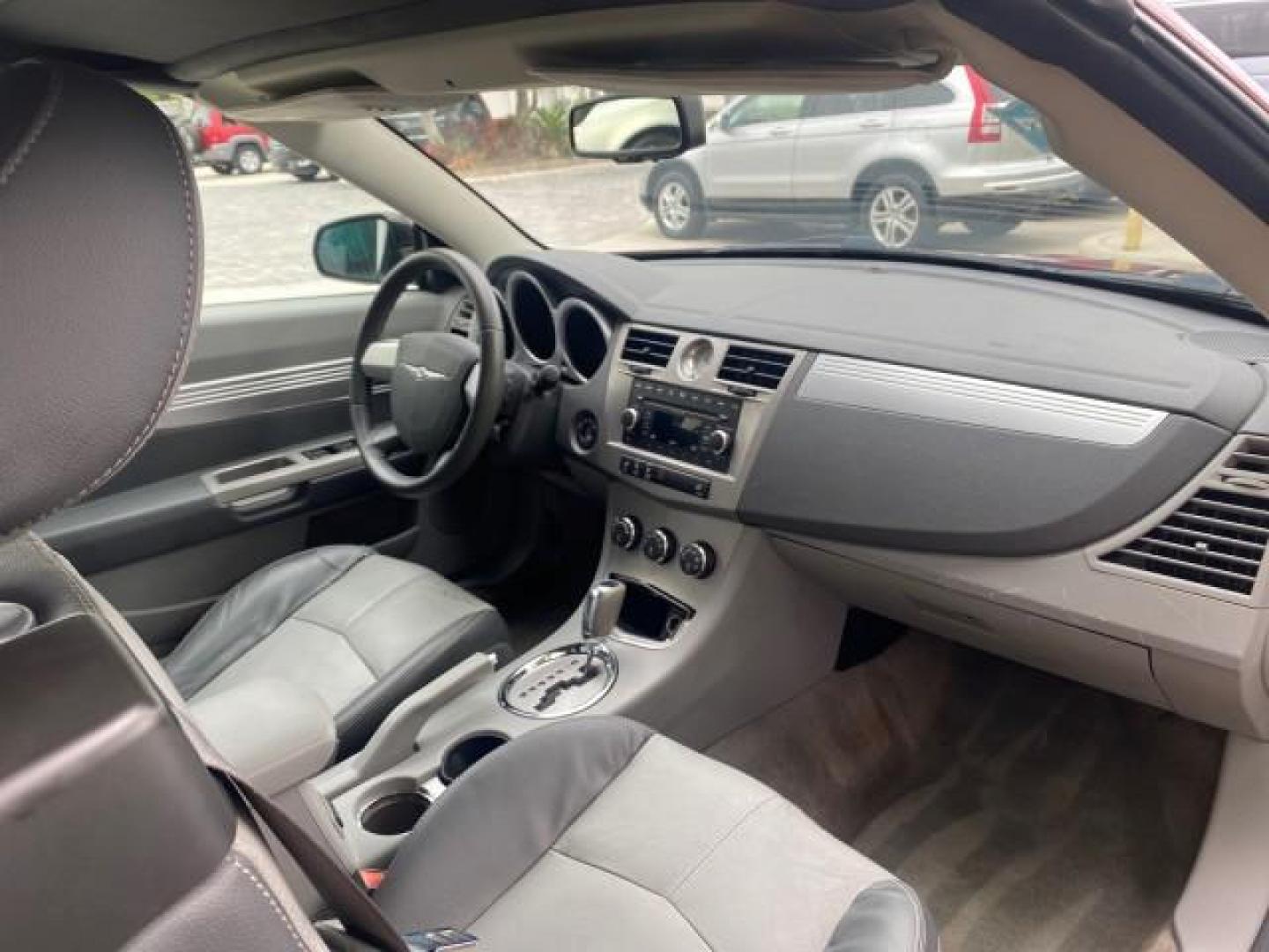 2008 Inferno Red Crystal /Dark/Light Slate Gray Chrysler Sebring FLORIDA 41 SERVICES CONVERTIBLE (1C3LC55R48N) with an 2.7L V6 Cylinder Engine engine, Automatic transmission, located at 4701 North Dixie Hwy, Pompano Beach, FL, 33064, (954) 422-2889, 26.240938, -80.123474 - OUR WEBPAGE FLORIDACARS1.COM HAS OVER 100 PHOTOS AND FREE CARFAX LINK 2008 CHRYSLER SEBRING TOURING VIN: 1C3LC55R48N657900 1 C 3 L C 5 5 R 4 8 N 6 5 7 9 0 0 CONVERTIBLE 2.7L V6 F DOHC 24V GASOLINE FRONT WHEEL DRIVE Top Features Alloy Wheels Satellite Radio Ready 2 Tone Leather Seats Soft Top Front S - Photo#90