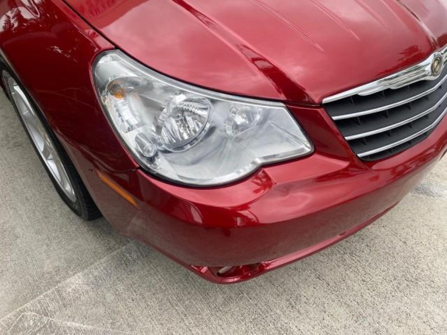 2008 Inferno Red Crystal /Dark/Light Slate Gray Chrysler Sebring FLORIDA 41 SERVICES CONVERTIBLE (1C3LC55R48N) with an 2.7L V6 Cylinder Engine engine, Automatic transmission, located at 4701 North Dixie Hwy, Pompano Beach, FL, 33064, (954) 422-2889, 26.240938, -80.123474 - OUR WEBPAGE FLORIDACARS1.COM HAS OVER 100 PHOTOS AND FREE CARFAX LINK 2008 CHRYSLER SEBRING TOURING VIN: 1C3LC55R48N657900 1 C 3 L C 5 5 R 4 8 N 6 5 7 9 0 0 CONVERTIBLE 2.7L V6 F DOHC 24V GASOLINE FRONT WHEEL DRIVE Top Features Alloy Wheels Satellite Radio Ready 2 Tone Leather Seats Soft Top Front S - Photo#97