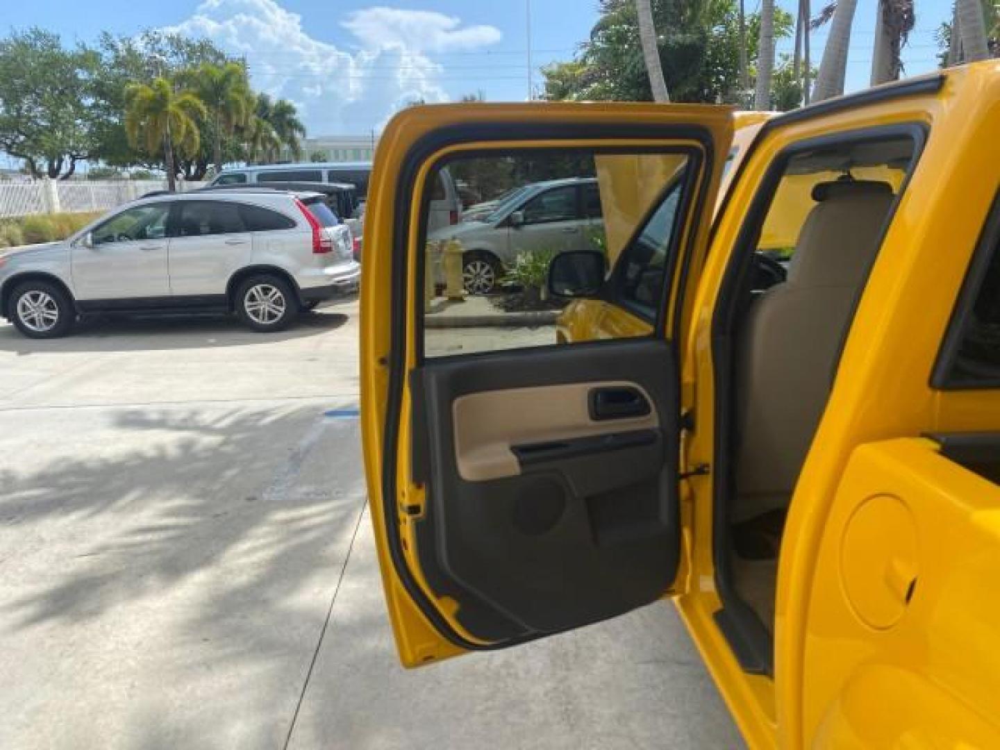 2006 Yellow /Light Cashmere Chevrolet Colorado LT FLORIDA LOW MILES 76.163 (1GCDS136768) with an 3.5L DOHC 5-Cyl MFI Engine engine, Automatic transmission, located at 4701 North Dixie Hwy, Pompano Beach, FL, 33064, (954) 422-2889, 26.240938, -80.123474 - OUR WEBPAGE FLORIDACARS1.COM HAS OVER 100 PHOTOS AND FREE CARFAX LINK 2006 CHEVROLET COLORADO LT Z71 VIN: 1GCDS136768220473 1 G C D S 1 3 6 7 6 8 2 2 0 4 7 3 CREW PICKUP 3.5L I5 F GASOLINE REAR WHEEL DRIVE Top Features Alloy Wheels Comfort Package Cloth Seats Convenience Package Basic Features ABS B - Photo#13