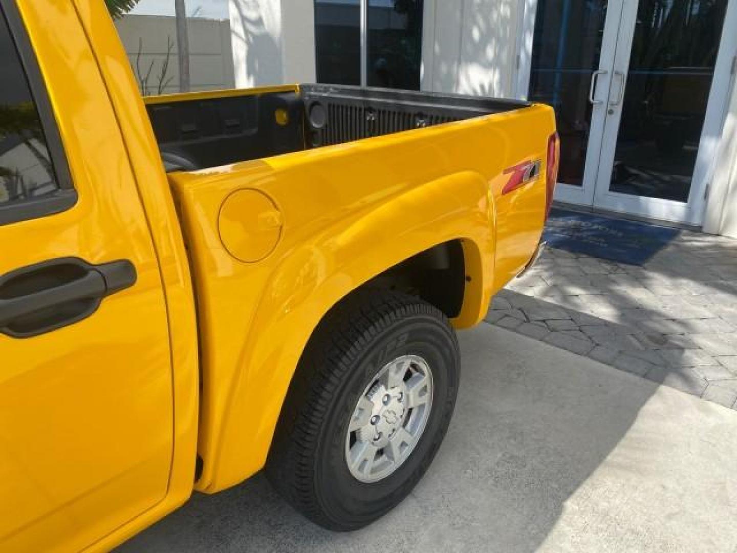 2006 Yellow /Light Cashmere Chevrolet Colorado LT FLORIDA LOW MILES 76.163 (1GCDS136768) with an 3.5L DOHC 5-Cyl MFI Engine engine, Automatic transmission, located at 4701 North Dixie Hwy, Pompano Beach, FL, 33064, (954) 422-2889, 26.240938, -80.123474 - OUR WEBPAGE FLORIDACARS1.COM HAS OVER 100 PHOTOS AND FREE CARFAX LINK 2006 CHEVROLET COLORADO LT Z71 VIN: 1GCDS136768220473 1 G C D S 1 3 6 7 6 8 2 2 0 4 7 3 CREW PICKUP 3.5L I5 F GASOLINE REAR WHEEL DRIVE Top Features Alloy Wheels Comfort Package Cloth Seats Convenience Package Basic Features ABS B - Photo#71