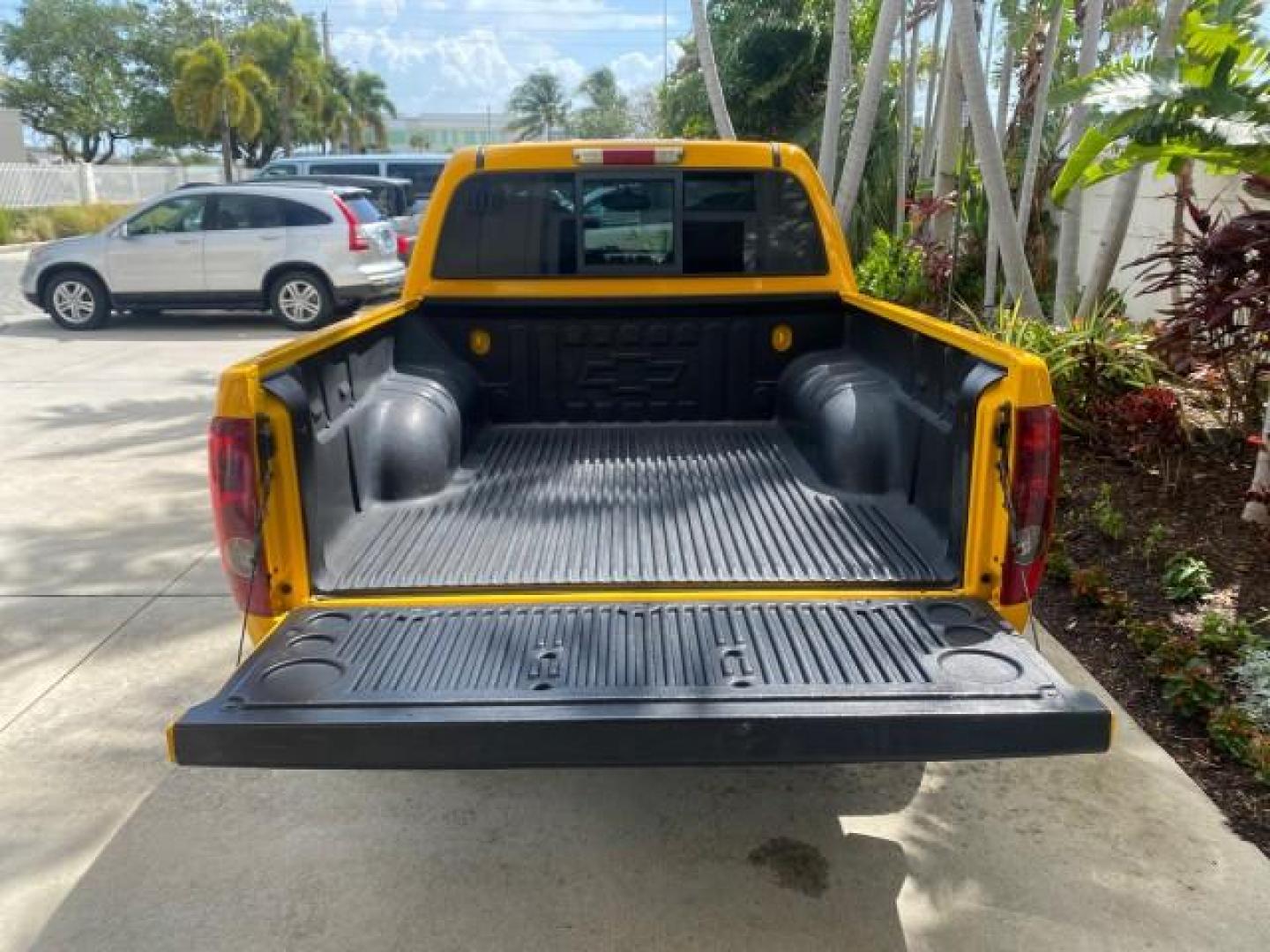 2006 Yellow /Light Cashmere Chevrolet Colorado LT FLORIDA LOW MILES 76.163 (1GCDS136768) with an 3.5L DOHC 5-Cyl MFI Engine engine, Automatic transmission, located at 4701 North Dixie Hwy, Pompano Beach, FL, 33064, (954) 422-2889, 26.240938, -80.123474 - OUR WEBPAGE FLORIDACARS1.COM HAS OVER 100 PHOTOS AND FREE CARFAX LINK 2006 CHEVROLET COLORADO LT Z71 VIN: 1GCDS136768220473 1 G C D S 1 3 6 7 6 8 2 2 0 4 7 3 CREW PICKUP 3.5L I5 F GASOLINE REAR WHEEL DRIVE Top Features Alloy Wheels Comfort Package Cloth Seats Convenience Package Basic Features ABS B - Photo#79