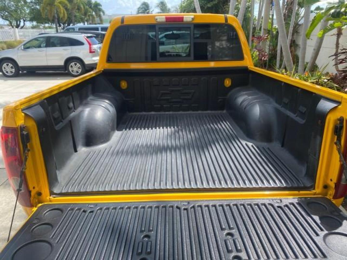 2006 Yellow /Light Cashmere Chevrolet Colorado LT FLORIDA LOW MILES 76.163 (1GCDS136768) with an 3.5L DOHC 5-Cyl MFI Engine engine, Automatic transmission, located at 4701 North Dixie Hwy, Pompano Beach, FL, 33064, (954) 422-2889, 26.240938, -80.123474 - OUR WEBPAGE FLORIDACARS1.COM HAS OVER 100 PHOTOS AND FREE CARFAX LINK 2006 CHEVROLET COLORADO LT Z71 VIN: 1GCDS136768220473 1 G C D S 1 3 6 7 6 8 2 2 0 4 7 3 CREW PICKUP 3.5L I5 F GASOLINE REAR WHEEL DRIVE Top Features Alloy Wheels Comfort Package Cloth Seats Convenience Package Basic Features ABS B - Photo#80
