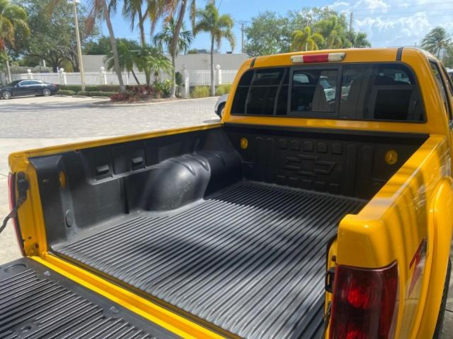 2006 Yellow /Light Cashmere Chevrolet Colorado LT FLORIDA LOW MILES 76.163 (1GCDS136768) with an 3.5L DOHC 5-Cyl MFI Engine engine, Automatic transmission, located at 4701 North Dixie Hwy, Pompano Beach, FL, 33064, (954) 422-2889, 26.240938, -80.123474 - OUR WEBPAGE FLORIDACARS1.COM HAS OVER 100 PHOTOS AND FREE CARFAX LINK 2006 CHEVROLET COLORADO LT Z71 VIN: 1GCDS136768220473 1 G C D S 1 3 6 7 6 8 2 2 0 4 7 3 CREW PICKUP 3.5L I5 F GASOLINE REAR WHEEL DRIVE Top Features Alloy Wheels Comfort Package Cloth Seats Convenience Package Basic Features ABS B - Photo#82