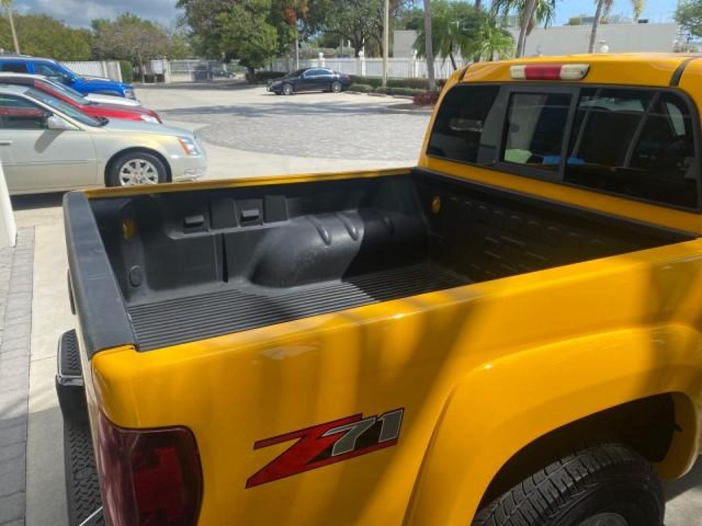 2006 Yellow /Light Cashmere Chevrolet Colorado LT FLORIDA LOW MILES 76.163 (1GCDS136768) with an 3.5L DOHC 5-Cyl MFI Engine engine, Automatic transmission, located at 4701 North Dixie Hwy, Pompano Beach, FL, 33064, (954) 422-2889, 26.240938, -80.123474 - OUR WEBPAGE FLORIDACARS1.COM HAS OVER 100 PHOTOS AND FREE CARFAX LINK 2006 CHEVROLET COLORADO LT Z71 VIN: 1GCDS136768220473 1 G C D S 1 3 6 7 6 8 2 2 0 4 7 3 CREW PICKUP 3.5L I5 F GASOLINE REAR WHEEL DRIVE Top Features Alloy Wheels Comfort Package Cloth Seats Convenience Package Basic Features ABS B - Photo#86