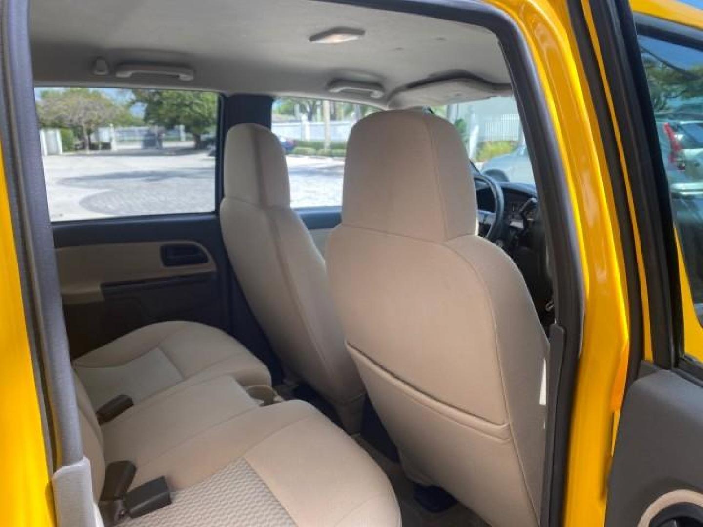 2006 Yellow /Light Cashmere Chevrolet Colorado LT FLORIDA LOW MILES 76.163 (1GCDS136768) with an 3.5L DOHC 5-Cyl MFI Engine engine, Automatic transmission, located at 4701 North Dixie Hwy, Pompano Beach, FL, 33064, (954) 422-2889, 26.240938, -80.123474 - OUR WEBPAGE FLORIDACARS1.COM HAS OVER 100 PHOTOS AND FREE CARFAX LINK 2006 CHEVROLET COLORADO LT Z71 VIN: 1GCDS136768220473 1 G C D S 1 3 6 7 6 8 2 2 0 4 7 3 CREW PICKUP 3.5L I5 F GASOLINE REAR WHEEL DRIVE Top Features Alloy Wheels Comfort Package Cloth Seats Convenience Package Basic Features ABS B - Photo#92
