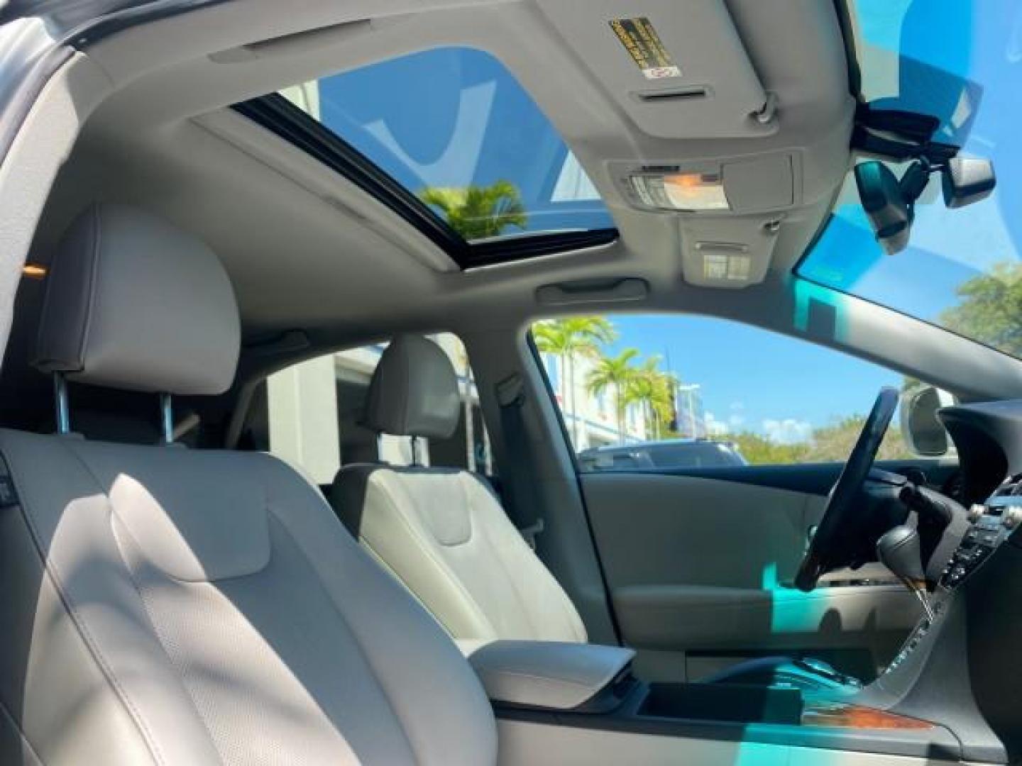 2010 Starfire Pearl /Light Gray Lexus RX 350 1 NC LOW MILES 83,532 AWD (2T2BK1BA8AC) with an 3.5L DOHC SFI 24-Valve V6 Engine engine, Automatic transmission, located at 4701 North Dixie Hwy, Pompano Beach, FL, 33064, (954) 422-2889, 26.240938, -80.123474 - OUR WEBPAGE FLORIDACARS1.COM HAS OVER 100 PHOTOS AND FREE CARFAX LINK 2010 LEXUS RX 350 NAVIGATION VIN: 2T2BK1BA8AC005951 2 T 2 B K 1 B A 8 A C 0 0 5 9 5 1 4 DOOR WAGON/SPORT UTILITY 3.5L V6 F DOHC 24V GASOLINE ALL WHEEL DRIVE Top Features 4WD/AWD Leather Seats Alloy Wheels Satellite Radio Ready Blu - Photo#99