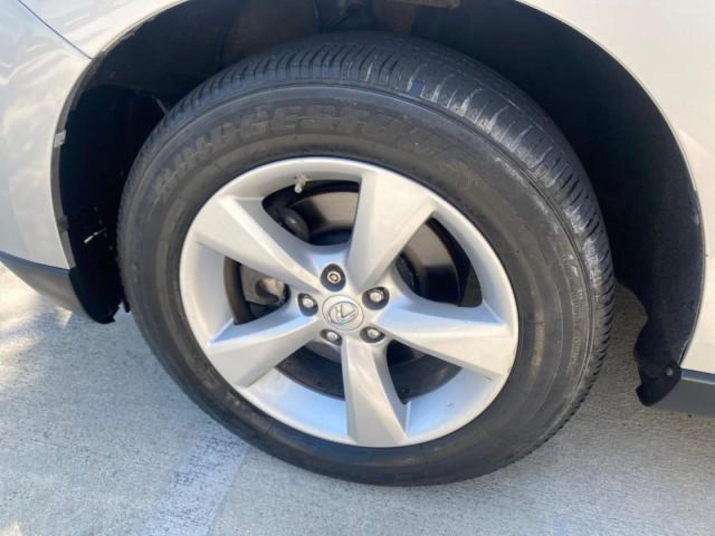 2010 Starfire Pearl /Light Gray Lexus RX 350 1 NC LOW MILES 83,532 AWD (2T2BK1BA8AC) with an 3.5L DOHC SFI 24-Valve V6 Engine engine, Automatic transmission, located at 4701 North Dixie Hwy, Pompano Beach, FL, 33064, (954) 422-2889, 26.240938, -80.123474 - OUR WEBPAGE FLORIDACARS1.COM HAS OVER 100 PHOTOS AND FREE CARFAX LINK 2010 LEXUS RX 350 NAVIGATION VIN: 2T2BK1BA8AC005951 2 T 2 B K 1 B A 8 A C 0 0 5 9 5 1 4 DOOR WAGON/SPORT UTILITY 3.5L V6 F DOHC 24V GASOLINE ALL WHEEL DRIVE Top Features 4WD/AWD Leather Seats Alloy Wheels Satellite Radio Ready Blu - Photo#19