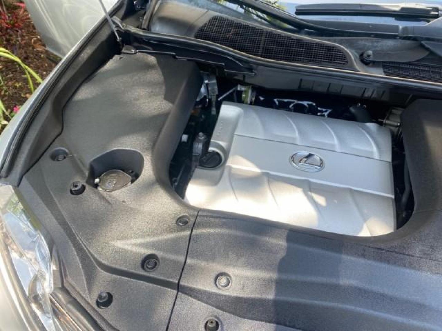 2010 Starfire Pearl /Light Gray Lexus RX 350 1 NC LOW MILES 83,532 AWD (2T2BK1BA8AC) with an 3.5L DOHC SFI 24-Valve V6 Engine engine, Automatic transmission, located at 4701 North Dixie Hwy, Pompano Beach, FL, 33064, (954) 422-2889, 26.240938, -80.123474 - OUR WEBPAGE FLORIDACARS1.COM HAS OVER 100 PHOTOS AND FREE CARFAX LINK 2010 LEXUS RX 350 NAVIGATION VIN: 2T2BK1BA8AC005951 2 T 2 B K 1 B A 8 A C 0 0 5 9 5 1 4 DOOR WAGON/SPORT UTILITY 3.5L V6 F DOHC 24V GASOLINE ALL WHEEL DRIVE Top Features 4WD/AWD Leather Seats Alloy Wheels Satellite Radio Ready Blu - Photo#25