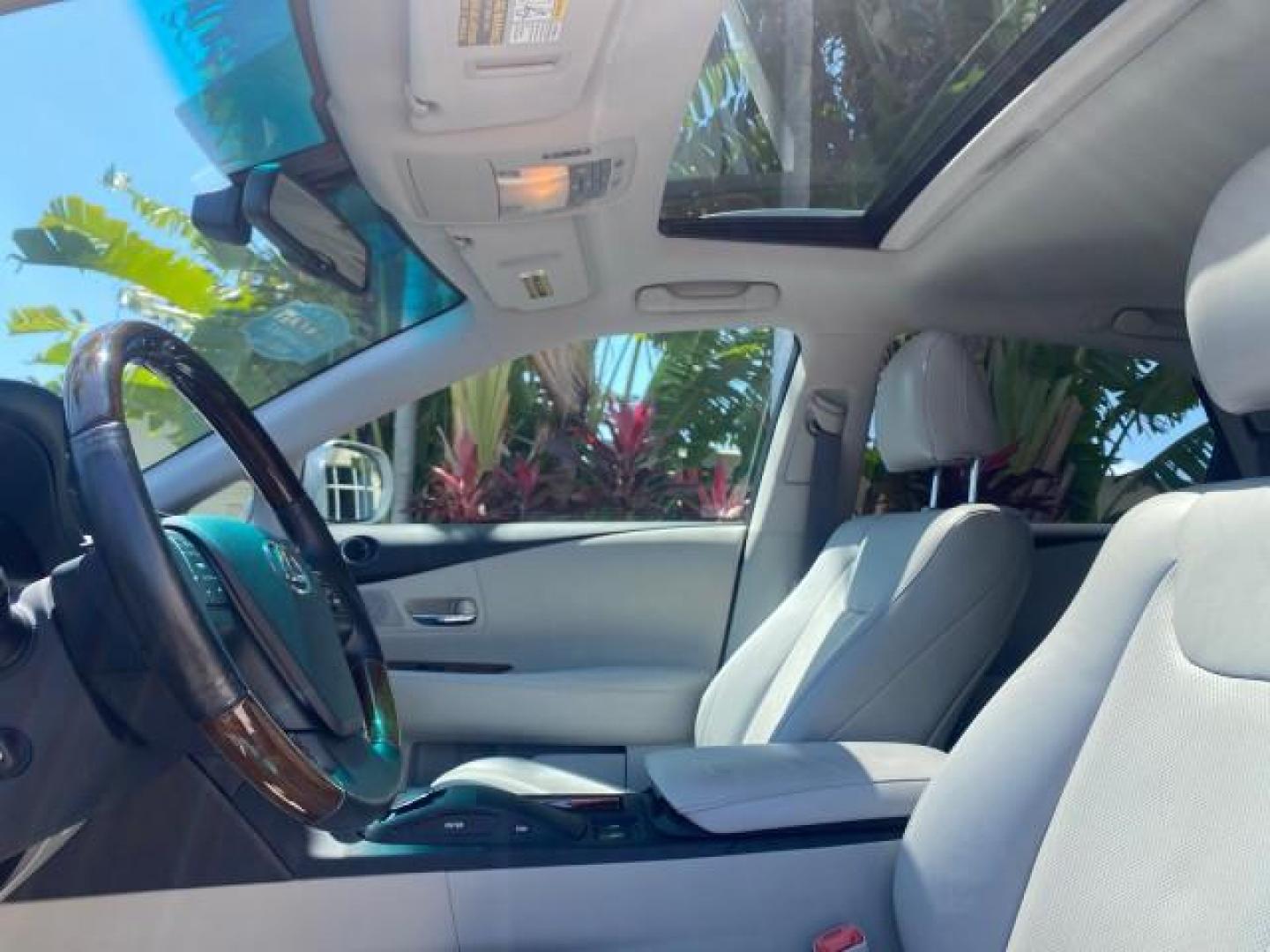 2010 Starfire Pearl /Light Gray Lexus RX 350 1 NC LOW MILES 83,532 AWD (2T2BK1BA8AC) with an 3.5L DOHC SFI 24-Valve V6 Engine engine, Automatic transmission, located at 4701 North Dixie Hwy, Pompano Beach, FL, 33064, (954) 422-2889, 26.240938, -80.123474 - OUR WEBPAGE FLORIDACARS1.COM HAS OVER 100 PHOTOS AND FREE CARFAX LINK 2010 LEXUS RX 350 NAVIGATION VIN: 2T2BK1BA8AC005951 2 T 2 B K 1 B A 8 A C 0 0 5 9 5 1 4 DOOR WAGON/SPORT UTILITY 3.5L V6 F DOHC 24V GASOLINE ALL WHEEL DRIVE Top Features 4WD/AWD Leather Seats Alloy Wheels Satellite Radio Ready Blu - Photo#59