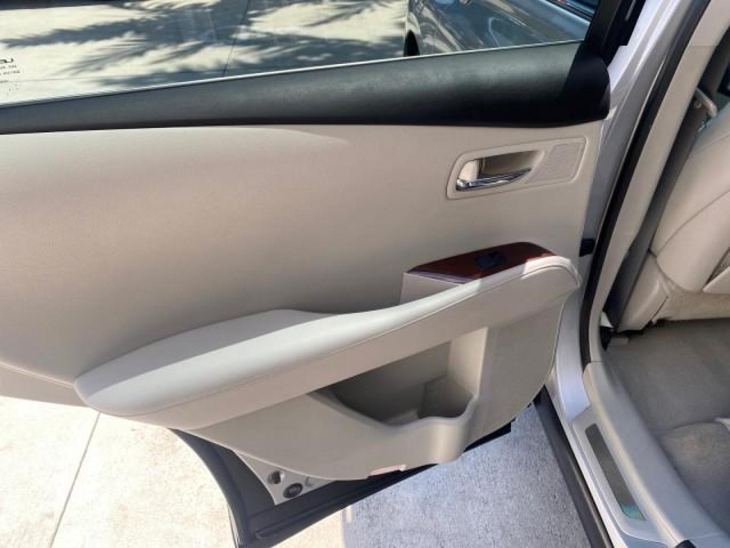 2010 Starfire Pearl /Light Gray Lexus RX 350 1 NC LOW MILES 83,532 AWD (2T2BK1BA8AC) with an 3.5L DOHC SFI 24-Valve V6 Engine engine, Automatic transmission, located at 4701 North Dixie Hwy, Pompano Beach, FL, 33064, (954) 422-2889, 26.240938, -80.123474 - OUR WEBPAGE FLORIDACARS1.COM HAS OVER 100 PHOTOS AND FREE CARFAX LINK 2010 LEXUS RX 350 NAVIGATION VIN: 2T2BK1BA8AC005951 2 T 2 B K 1 B A 8 A C 0 0 5 9 5 1 4 DOOR WAGON/SPORT UTILITY 3.5L V6 F DOHC 24V GASOLINE ALL WHEEL DRIVE Top Features 4WD/AWD Leather Seats Alloy Wheels Satellite Radio Ready Blu - Photo#63