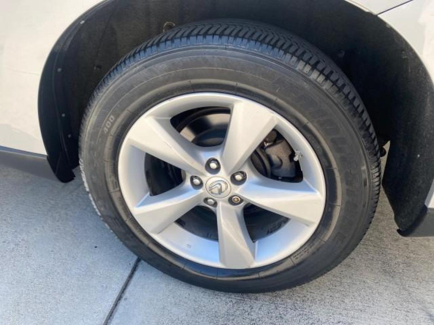 2010 Starfire Pearl /Light Gray Lexus RX 350 1 NC LOW MILES 83,532 AWD (2T2BK1BA8AC) with an 3.5L DOHC SFI 24-Valve V6 Engine engine, Automatic transmission, located at 4701 North Dixie Hwy, Pompano Beach, FL, 33064, (954) 422-2889, 26.240938, -80.123474 - OUR WEBPAGE FLORIDACARS1.COM HAS OVER 100 PHOTOS AND FREE CARFAX LINK 2010 LEXUS RX 350 NAVIGATION VIN: 2T2BK1BA8AC005951 2 T 2 B K 1 B A 8 A C 0 0 5 9 5 1 4 DOOR WAGON/SPORT UTILITY 3.5L V6 F DOHC 24V GASOLINE ALL WHEEL DRIVE Top Features 4WD/AWD Leather Seats Alloy Wheels Satellite Radio Ready Blu - Photo#71