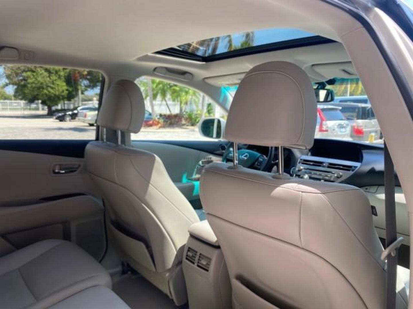 2010 Starfire Pearl /Light Gray Lexus RX 350 1 NC LOW MILES 83,532 AWD (2T2BK1BA8AC) with an 3.5L DOHC SFI 24-Valve V6 Engine engine, Automatic transmission, located at 4701 North Dixie Hwy, Pompano Beach, FL, 33064, (954) 422-2889, 26.240938, -80.123474 - OUR WEBPAGE FLORIDACARS1.COM HAS OVER 100 PHOTOS AND FREE CARFAX LINK 2010 LEXUS RX 350 NAVIGATION VIN: 2T2BK1BA8AC005951 2 T 2 B K 1 B A 8 A C 0 0 5 9 5 1 4 DOOR WAGON/SPORT UTILITY 3.5L V6 F DOHC 24V GASOLINE ALL WHEEL DRIVE Top Features 4WD/AWD Leather Seats Alloy Wheels Satellite Radio Ready Blu - Photo#89