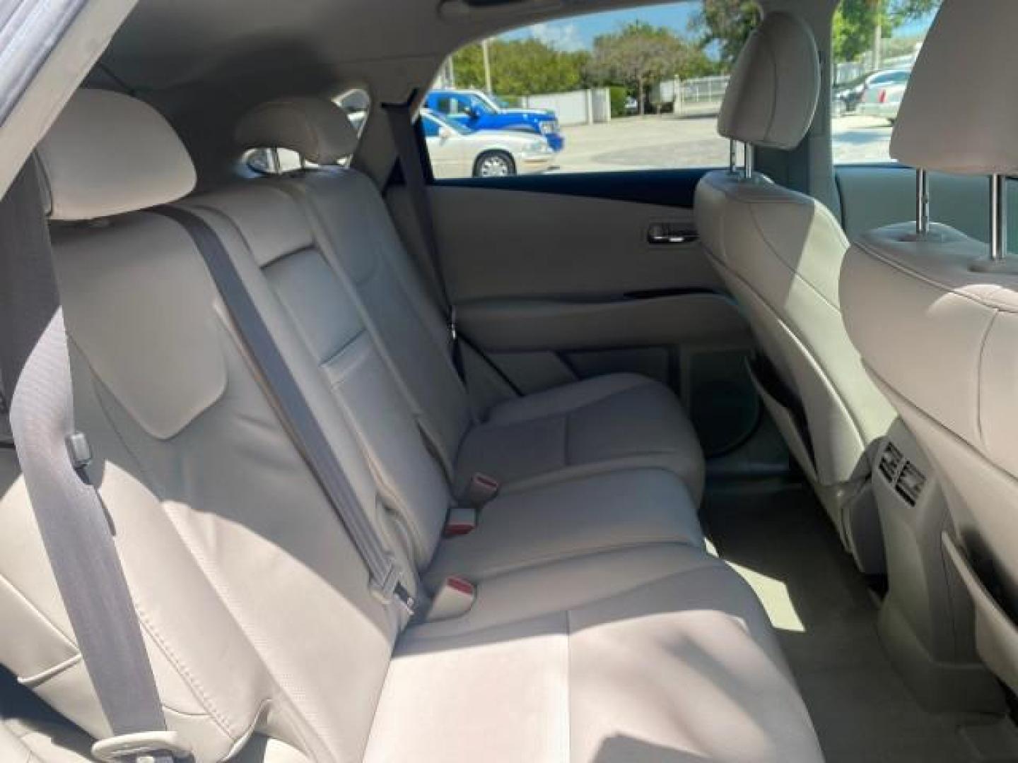 2010 Starfire Pearl /Light Gray Lexus RX 350 1 NC LOW MILES 83,532 AWD (2T2BK1BA8AC) with an 3.5L DOHC SFI 24-Valve V6 Engine engine, Automatic transmission, located at 4701 North Dixie Hwy, Pompano Beach, FL, 33064, (954) 422-2889, 26.240938, -80.123474 - OUR WEBPAGE FLORIDACARS1.COM HAS OVER 100 PHOTOS AND FREE CARFAX LINK 2010 LEXUS RX 350 NAVIGATION VIN: 2T2BK1BA8AC005951 2 T 2 B K 1 B A 8 A C 0 0 5 9 5 1 4 DOOR WAGON/SPORT UTILITY 3.5L V6 F DOHC 24V GASOLINE ALL WHEEL DRIVE Top Features 4WD/AWD Leather Seats Alloy Wheels Satellite Radio Ready Blu - Photo#90
