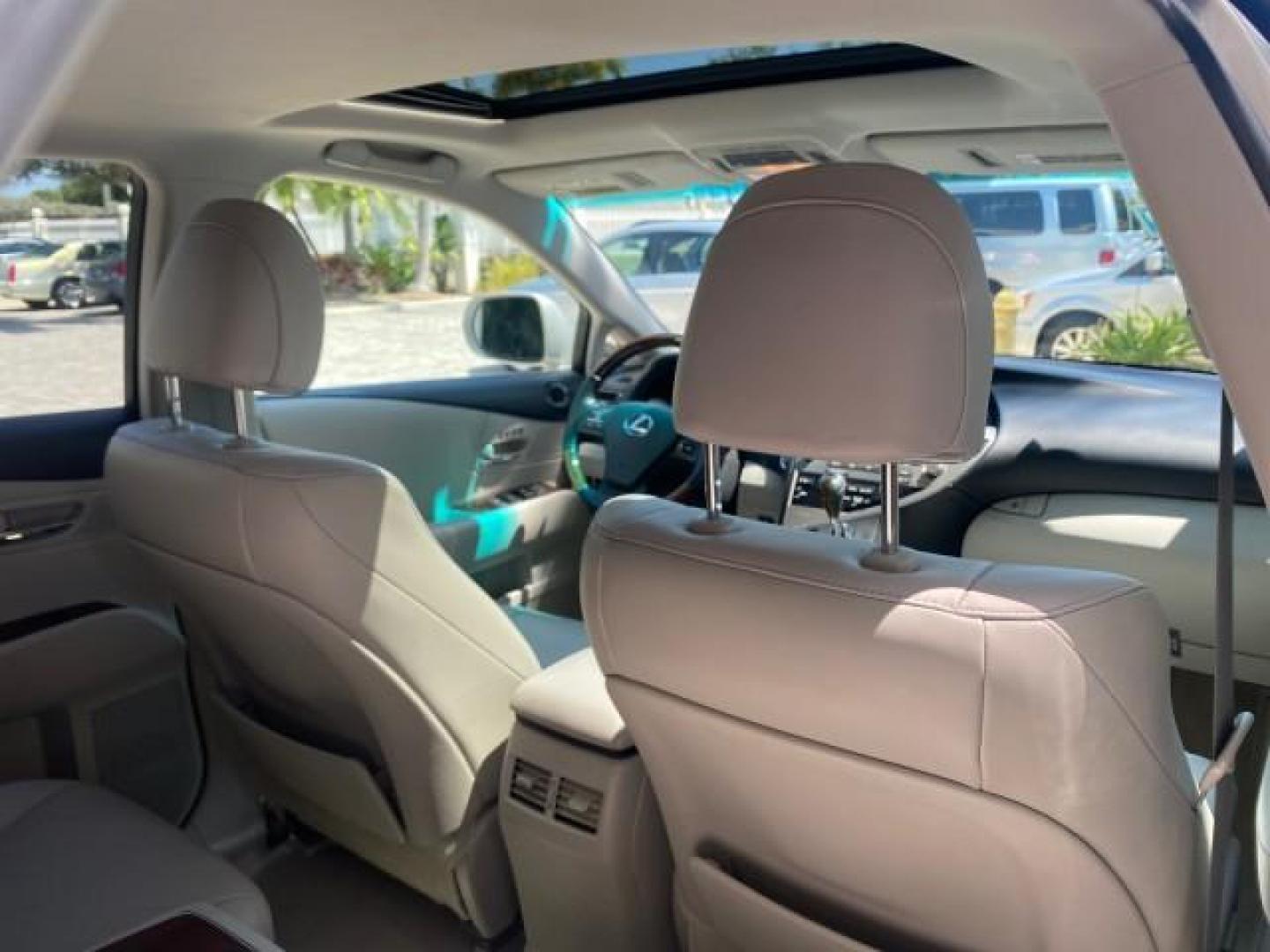 2010 Starfire Pearl /Light Gray Lexus RX 350 1 NC LOW MILES 83,532 AWD (2T2BK1BA8AC) with an 3.5L DOHC SFI 24-Valve V6 Engine engine, Automatic transmission, located at 4701 North Dixie Hwy, Pompano Beach, FL, 33064, (954) 422-2889, 26.240938, -80.123474 - OUR WEBPAGE FLORIDACARS1.COM HAS OVER 100 PHOTOS AND FREE CARFAX LINK 2010 LEXUS RX 350 NAVIGATION VIN: 2T2BK1BA8AC005951 2 T 2 B K 1 B A 8 A C 0 0 5 9 5 1 4 DOOR WAGON/SPORT UTILITY 3.5L V6 F DOHC 24V GASOLINE ALL WHEEL DRIVE Top Features 4WD/AWD Leather Seats Alloy Wheels Satellite Radio Ready Blu - Photo#93