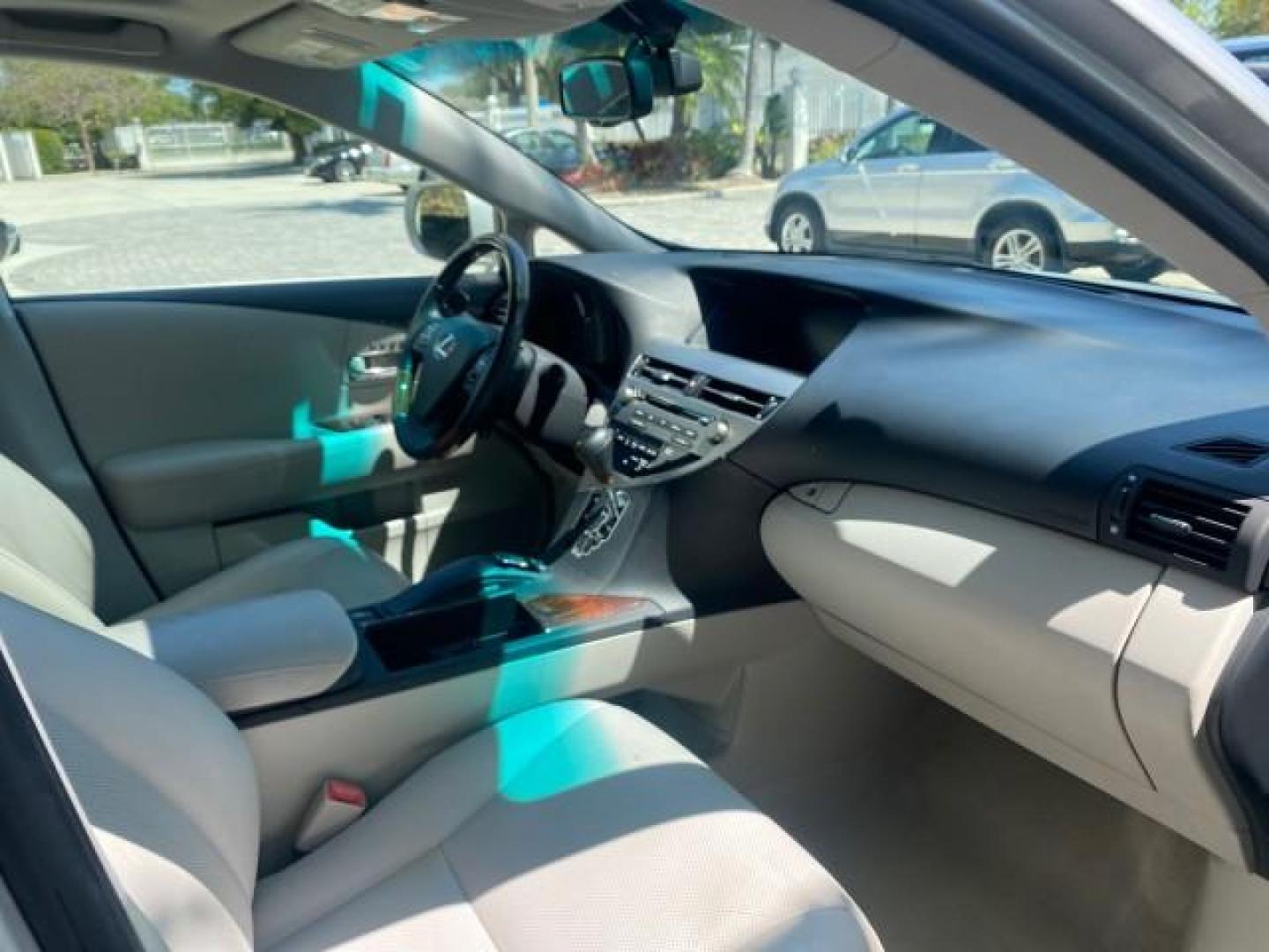2010 Starfire Pearl /Light Gray Lexus RX 350 1 NC LOW MILES 83,532 AWD (2T2BK1BA8AC) with an 3.5L DOHC SFI 24-Valve V6 Engine engine, Automatic transmission, located at 4701 North Dixie Hwy, Pompano Beach, FL, 33064, (954) 422-2889, 26.240938, -80.123474 - OUR WEBPAGE FLORIDACARS1.COM HAS OVER 100 PHOTOS AND FREE CARFAX LINK 2010 LEXUS RX 350 NAVIGATION VIN: 2T2BK1BA8AC005951 2 T 2 B K 1 B A 8 A C 0 0 5 9 5 1 4 DOOR WAGON/SPORT UTILITY 3.5L V6 F DOHC 24V GASOLINE ALL WHEEL DRIVE Top Features 4WD/AWD Leather Seats Alloy Wheels Satellite Radio Ready Blu - Photo#98