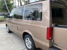 2004 Bronzemist Metallic /Medium Gray Chevrolet Astro Passenger 8 PASSENGER LOW MILES 89,997 (1GNDM19X04B) with an 4.3L Vortec 4300 V6 MFI Engine engine, Automatic transmission, located at 4701 North Dixie Hwy, Pompano Beach, FL, 33064, (954) 422-2889, 26.240938, -80.123474 - OUR WEBPAGE FLORIDACARS1.COM HAS OVER 100 PHOTOS AND FREE CARFAX LINK 2004 CHEVROLET ASTRO VIN: 1GNDM19X04B102587 1 G N D M 1 9 X 0 4 B 1 0 2 5 8 7 VAN 4.3L V6 F GASOLINE REAR WHEEL DRIVE Highlighted Features Bed Liner Cloth Seats ABS Brakes Automatic Transmission Power Locks AM/FM Stereo CD Audio P - Photo#64