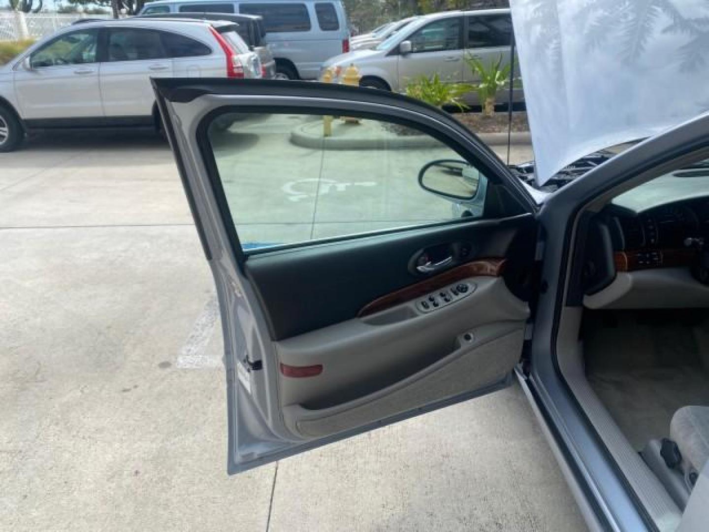 2005 Platinum Metallic /Gray Buick LeSabre Custom 1 OWNER LOW MILES 34,370 (1G4HP52K15U) with an 3.8L 3800 V6 SFI Engine engine, Automatic transmission, located at 4701 North Dixie Hwy, Pompano Beach, FL, 33064, (954) 422-2889, 26.240938, -80.123474 - OUR WEBPAGE FLORIDACARS1.COM HAS OVER 100 PHOTOS AND FREE CARFAX LINK 2005 BUICK LESABRE CUSTOM VIN: 1G4HP52K15U173399 1 G 4 H P 5 2 K 1 5 U 1 7 3 3 9 9 SEDAN 4 DR 3.8L V6 F OHV 29 MPG GASOLINE FRONT WHEEL DRIVE Top Features Alloy Wheels Cloth Seats Basic Features ABS Brakes CD Audio Power Mirrors S - Photo#9