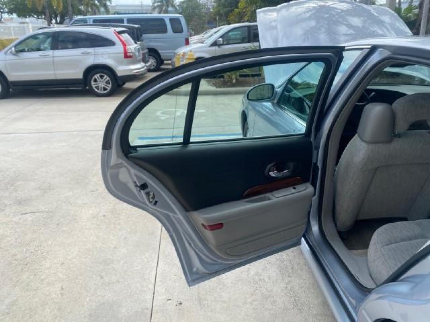2005 Platinum Metallic /Gray Buick LeSabre Custom 1 OWNER LOW MILES 34,370 (1G4HP52K15U) with an 3.8L 3800 V6 SFI Engine engine, Automatic transmission, located at 4701 North Dixie Hwy, Pompano Beach, FL, 33064, (954) 422-2889, 26.240938, -80.123474 - OUR WEBPAGE FLORIDACARS1.COM HAS OVER 100 PHOTOS AND FREE CARFAX LINK 2005 BUICK LESABRE CUSTOM VIN: 1G4HP52K15U173399 1 G 4 H P 5 2 K 1 5 U 1 7 3 3 9 9 SEDAN 4 DR 3.8L V6 F OHV 29 MPG GASOLINE FRONT WHEEL DRIVE Top Features Alloy Wheels Cloth Seats Basic Features ABS Brakes CD Audio Power Mirrors S - Photo#13