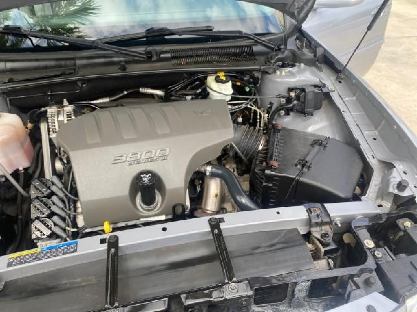 2005 Platinum Metallic /Gray Buick LeSabre Custom 1 OWNER LOW MILES 34,370 (1G4HP52K15U) with an 3.8L 3800 V6 SFI Engine engine, Automatic transmission, located at 4701 North Dixie Hwy, Pompano Beach, FL, 33064, (954) 422-2889, 26.240938, -80.123474 - OUR WEBPAGE FLORIDACARS1.COM HAS OVER 100 PHOTOS AND FREE CARFAX LINK 2005 BUICK LESABRE CUSTOM VIN: 1G4HP52K15U173399 1 G 4 H P 5 2 K 1 5 U 1 7 3 3 9 9 SEDAN 4 DR 3.8L V6 F OHV 29 MPG GASOLINE FRONT WHEEL DRIVE Top Features Alloy Wheels Cloth Seats Basic Features ABS Brakes CD Audio Power Mirrors S - Photo#25