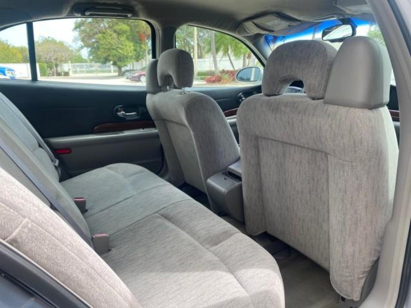 2005 Platinum Metallic /Gray Buick LeSabre Custom 1 OWNER LOW MILES 34,370 (1G4HP52K15U) with an 3.8L 3800 V6 SFI Engine engine, Automatic transmission, located at 4701 North Dixie Hwy, Pompano Beach, FL, 33064, (954) 422-2889, 26.240938, -80.123474 - OUR WEBPAGE FLORIDACARS1.COM HAS OVER 100 PHOTOS AND FREE CARFAX LINK 2005 BUICK LESABRE CUSTOM VIN: 1G4HP52K15U173399 1 G 4 H P 5 2 K 1 5 U 1 7 3 3 9 9 SEDAN 4 DR 3.8L V6 F OHV 29 MPG GASOLINE FRONT WHEEL DRIVE Top Features Alloy Wheels Cloth Seats Basic Features ABS Brakes CD Audio Power Mirrors S - Photo#83