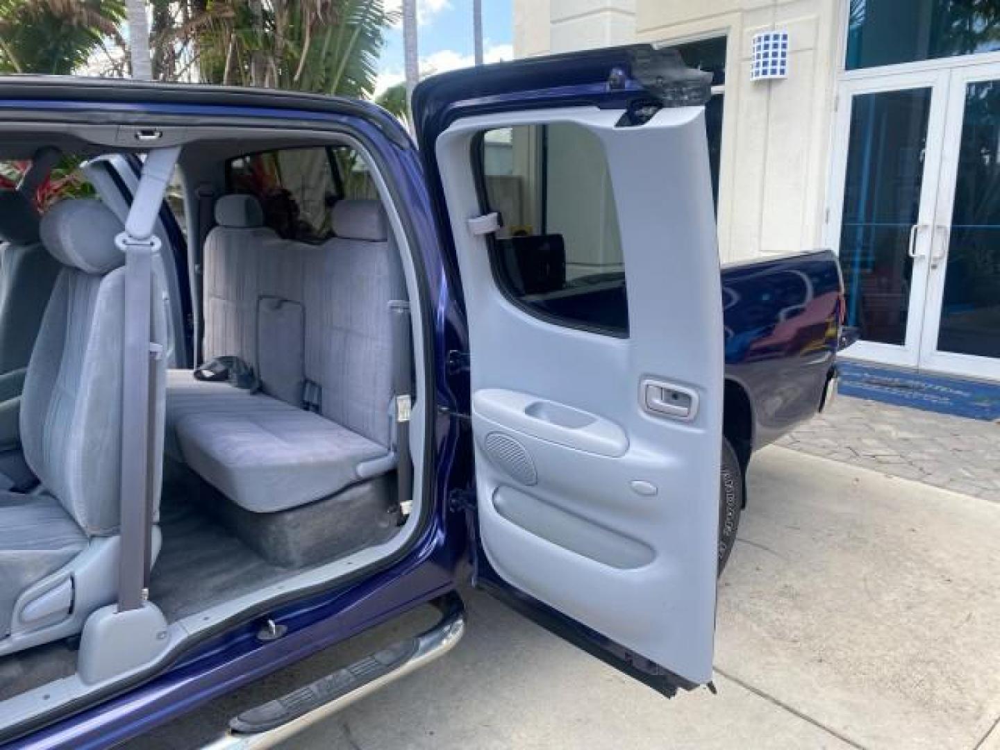 2000 Stellar Blue Pearl /Gray Toyota Tundra V 8 SR5 FLORIDA LIKE NEW (5TBRT3410YS) with an 4.7L DOHC EFI 32-Valve V8 i-Force Engine engine, Automatic transmission, located at 4701 North Dixie Hwy, Pompano Beach, FL, 33064, (954) 422-2889, 26.240938, -80.123474 - OUR WEBPAGE FLORIDACARS1.COM HAS OVER 100 PHOTOS AND FREE CARFAX LINK 2000 TOYOTA TUNDRA SR5 VIN: 5TBRT3410YS002335 5 T B R T 3 4 1 0 Y S 0 0 2 3 3 5 4 DOOR EXTENDED CAB PICKUP 4.7L V8 F DOHC 32V GASOLINE REAR WHEEL DRIVE Highlighted Features Bed Liner Cloth Seats ABS Brakes Automatic Transmission P - Photo#13