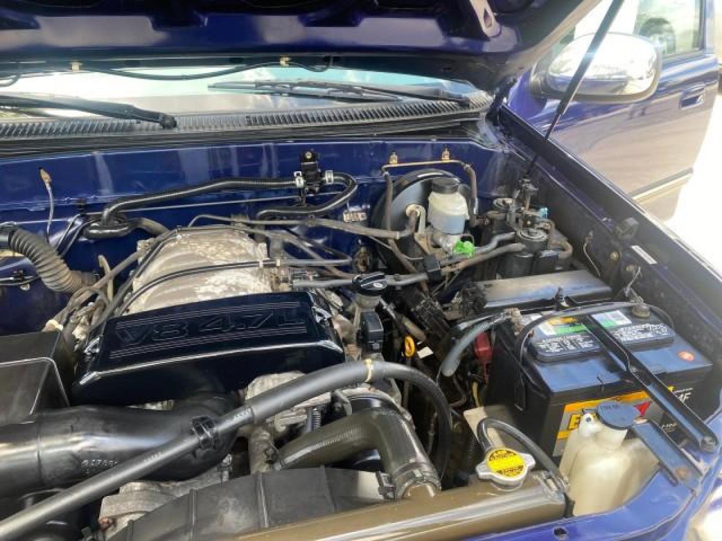 2000 Stellar Blue Pearl /Gray Toyota Tundra V 8 SR5 FLORIDA LIKE NEW (5TBRT3410YS) with an 4.7L DOHC EFI 32-Valve V8 i-Force Engine engine, Automatic transmission, located at 4701 North Dixie Hwy, Pompano Beach, FL, 33064, (954) 422-2889, 26.240938, -80.123474 - OUR WEBPAGE FLORIDACARS1.COM HAS OVER 100 PHOTOS AND FREE CARFAX LINK 2000 TOYOTA TUNDRA SR5 VIN: 5TBRT3410YS002335 5 T B R T 3 4 1 0 Y S 0 0 2 3 3 5 4 DOOR EXTENDED CAB PICKUP 4.7L V8 F DOHC 32V GASOLINE REAR WHEEL DRIVE Highlighted Features Bed Liner Cloth Seats ABS Brakes Automatic Transmission P - Photo#25