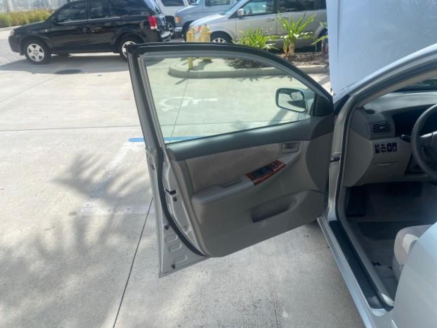 2006 Millenium Silver Metallic /Stone Toyota Corolla LE LOW MILES 23,038 LOADED (1NXBR30E16Z) with an 1.8L DOHC SEFI 16-Valve 4-Cyl Aluminum Engine engine, Automatic transmission, located at 4701 North Dixie Hwy, Pompano Beach, FL, 33064, (954) 422-2889, 26.240938, -80.123474 - OUR WEBPAGE FLORIDACARS1.COM HAS OVER 100 PHOTOS AND FREE CARFAX LINK 2006 TOYOTA COROLLA LE AUTO AC LOADED VIN: 1NXBR30E16Z662050 1 N X B R 3 0 E 1 6 Z 6 6 2 0 5 0 SEDAN 4 DR 1.8L I4 F DOHC 16V 41 MPG GASOLINE FRONT WHEEL DRIVE Top Features Cloth Seats Basic Features AM/FM Stereo CD Audio Power Mir - Photo#9
