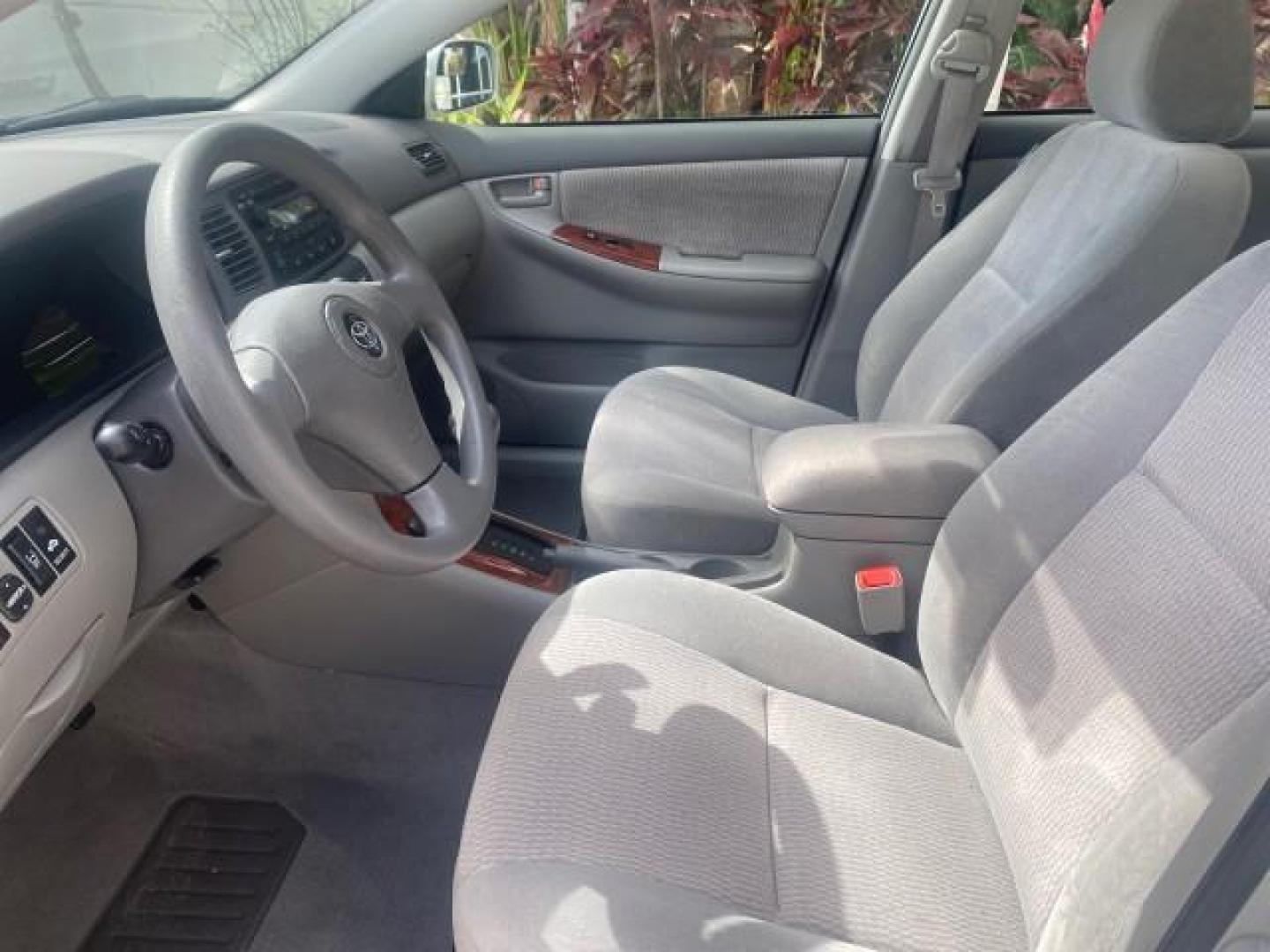 2006 Millenium Silver Metallic /Stone Toyota Corolla LE LOW MILES 23,038 LOADED (1NXBR30E16Z) with an 1.8L DOHC SEFI 16-Valve 4-Cyl Aluminum Engine engine, Automatic transmission, located at 4701 North Dixie Hwy, Pompano Beach, FL, 33064, (954) 422-2889, 26.240938, -80.123474 - OUR WEBPAGE FLORIDACARS1.COM HAS OVER 100 PHOTOS AND FREE CARFAX LINK 2006 TOYOTA COROLLA LE AUTO AC LOADED VIN: 1NXBR30E16Z662050 1 N X B R 3 0 E 1 6 Z 6 6 2 0 5 0 SEDAN 4 DR 1.8L I4 F DOHC 16V 41 MPG GASOLINE FRONT WHEEL DRIVE Top Features Cloth Seats Basic Features AM/FM Stereo CD Audio Power Mir - Photo#32