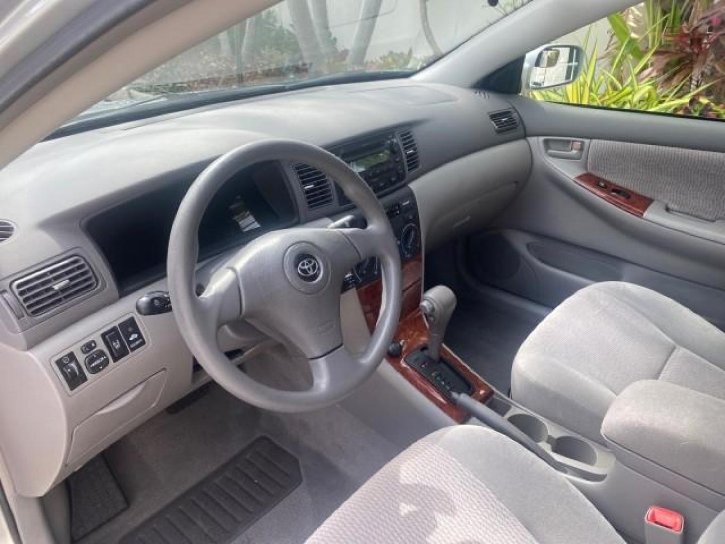 2006 Millenium Silver Metallic /Stone Toyota Corolla LE LOW MILES 23,038 LOADED (1NXBR30E16Z) with an 1.8L DOHC SEFI 16-Valve 4-Cyl Aluminum Engine engine, Automatic transmission, located at 4701 North Dixie Hwy, Pompano Beach, FL, 33064, (954) 422-2889, 26.240938, -80.123474 - OUR WEBPAGE FLORIDACARS1.COM HAS OVER 100 PHOTOS AND FREE CARFAX LINK 2006 TOYOTA COROLLA LE AUTO AC LOADED VIN: 1NXBR30E16Z662050 1 N X B R 3 0 E 1 6 Z 6 6 2 0 5 0 SEDAN 4 DR 1.8L I4 F DOHC 16V 41 MPG GASOLINE FRONT WHEEL DRIVE Top Features Cloth Seats Basic Features AM/FM Stereo CD Audio Power Mir - Photo#35
