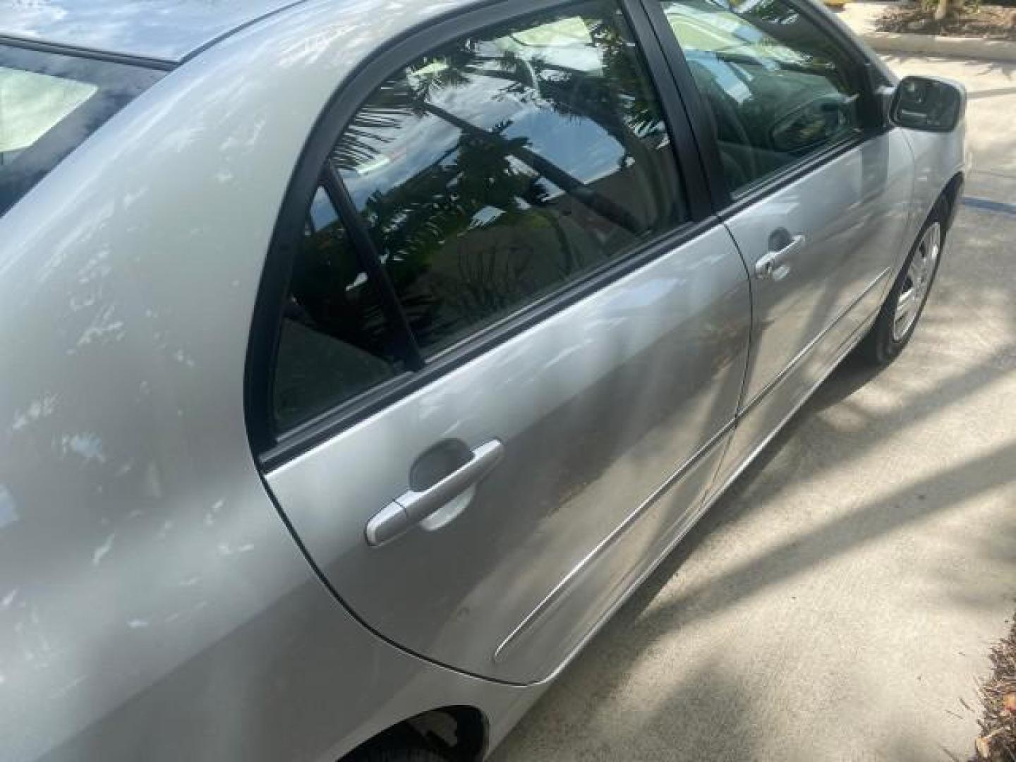 2006 Millenium Silver Metallic /Stone Toyota Corolla LE LOW MILES 23,038 LOADED (1NXBR30E16Z) with an 1.8L DOHC SEFI 16-Valve 4-Cyl Aluminum Engine engine, Automatic transmission, located at 4701 North Dixie Hwy, Pompano Beach, FL, 33064, (954) 422-2889, 26.240938, -80.123474 - OUR WEBPAGE FLORIDACARS1.COM HAS OVER 100 PHOTOS AND FREE CARFAX LINK 2006 TOYOTA COROLLA LE AUTO AC LOADED VIN: 1NXBR30E16Z662050 1 N X B R 3 0 E 1 6 Z 6 6 2 0 5 0 SEDAN 4 DR 1.8L I4 F DOHC 16V 41 MPG GASOLINE FRONT WHEEL DRIVE Top Features Cloth Seats Basic Features AM/FM Stereo CD Audio Power Mir - Photo#77