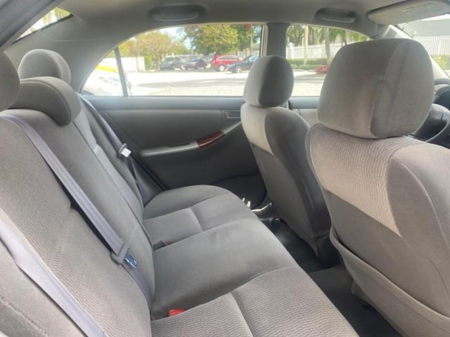 2006 Millenium Silver Metallic /Stone Toyota Corolla LE LOW MILES 23,038 LOADED (1NXBR30E16Z) with an 1.8L DOHC SEFI 16-Valve 4-Cyl Aluminum Engine engine, Automatic transmission, located at 4701 North Dixie Hwy, Pompano Beach, FL, 33064, (954) 422-2889, 26.240938, -80.123474 - OUR WEBPAGE FLORIDACARS1.COM HAS OVER 100 PHOTOS AND FREE CARFAX LINK 2006 TOYOTA COROLLA LE AUTO AC LOADED VIN: 1NXBR30E16Z662050 1 N X B R 3 0 E 1 6 Z 6 6 2 0 5 0 SEDAN 4 DR 1.8L I4 F DOHC 16V 41 MPG GASOLINE FRONT WHEEL DRIVE Top Features Cloth Seats Basic Features AM/FM Stereo CD Audio Power Mir - Photo#80