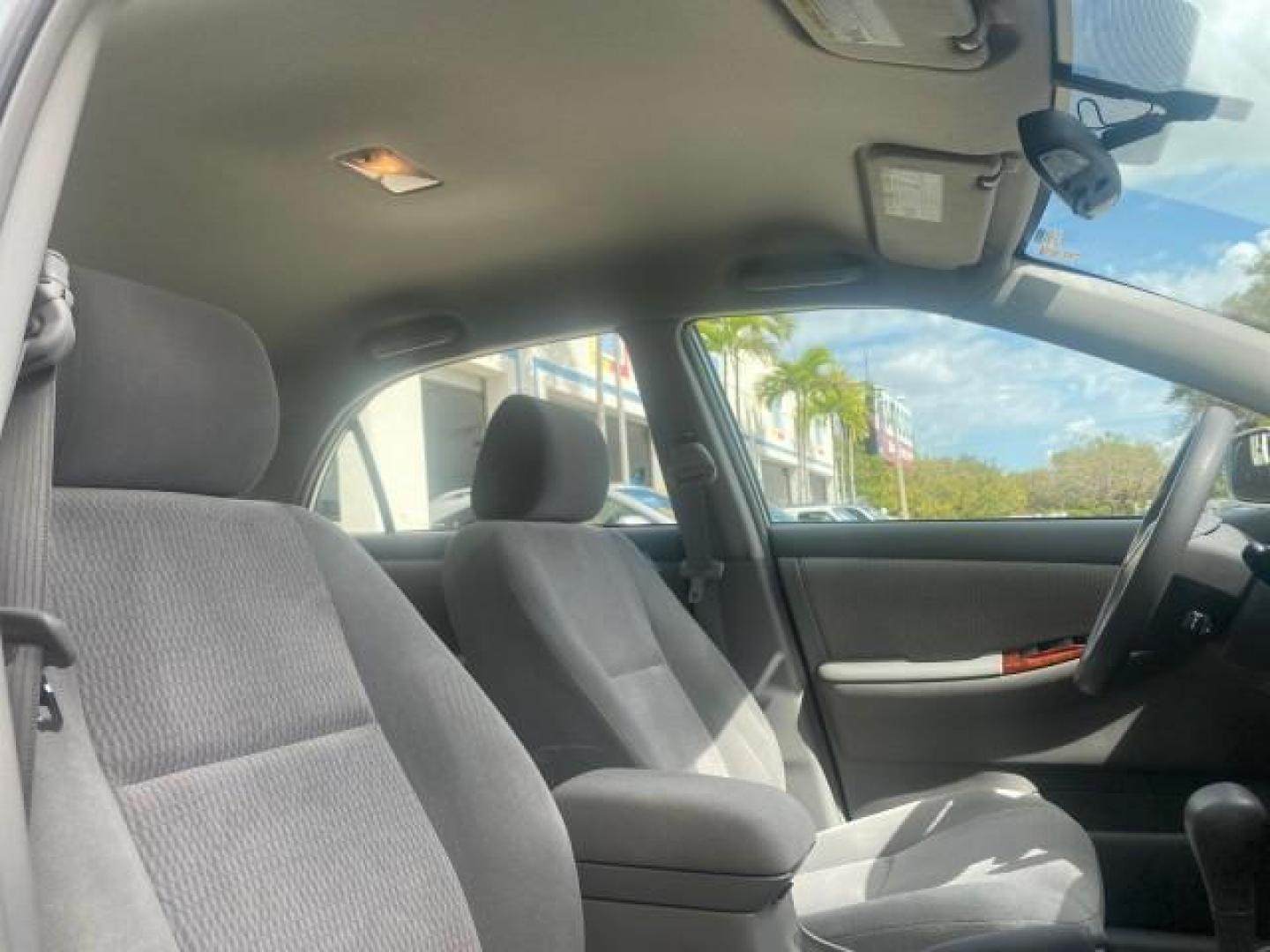 2006 Millenium Silver Metallic /Stone Toyota Corolla LE LOW MILES 23,038 LOADED (1NXBR30E16Z) with an 1.8L DOHC SEFI 16-Valve 4-Cyl Aluminum Engine engine, Automatic transmission, located at 4701 North Dixie Hwy, Pompano Beach, FL, 33064, (954) 422-2889, 26.240938, -80.123474 - OUR WEBPAGE FLORIDACARS1.COM HAS OVER 100 PHOTOS AND FREE CARFAX LINK 2006 TOYOTA COROLLA LE AUTO AC LOADED VIN: 1NXBR30E16Z662050 1 N X B R 3 0 E 1 6 Z 6 6 2 0 5 0 SEDAN 4 DR 1.8L I4 F DOHC 16V 41 MPG GASOLINE FRONT WHEEL DRIVE Top Features Cloth Seats Basic Features AM/FM Stereo CD Audio Power Mir - Photo#87