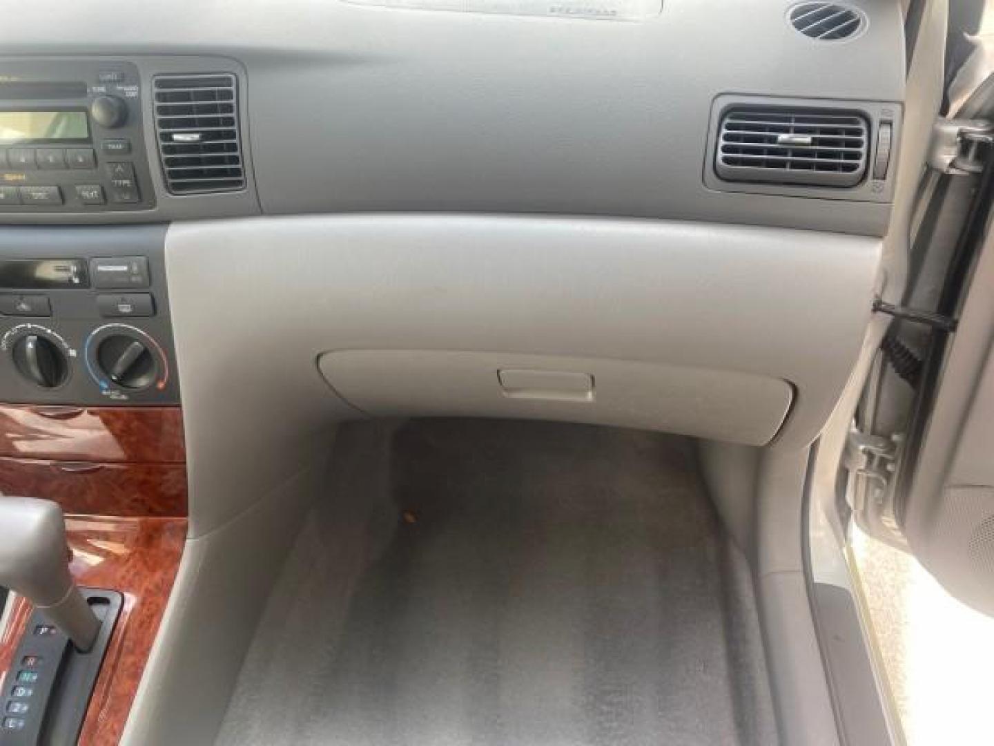 2006 Millenium Silver Metallic /Stone Toyota Corolla LE LOW MILES 23,038 LOADED (1NXBR30E16Z) with an 1.8L DOHC SEFI 16-Valve 4-Cyl Aluminum Engine engine, Automatic transmission, located at 4701 North Dixie Hwy, Pompano Beach, FL, 33064, (954) 422-2889, 26.240938, -80.123474 - OUR WEBPAGE FLORIDACARS1.COM HAS OVER 100 PHOTOS AND FREE CARFAX LINK 2006 TOYOTA COROLLA LE AUTO AC LOADED VIN: 1NXBR30E16Z662050 1 N X B R 3 0 E 1 6 Z 6 6 2 0 5 0 SEDAN 4 DR 1.8L I4 F DOHC 16V 41 MPG GASOLINE FRONT WHEEL DRIVE Top Features Cloth Seats Basic Features AM/FM Stereo CD Audio Power Mir - Photo#89