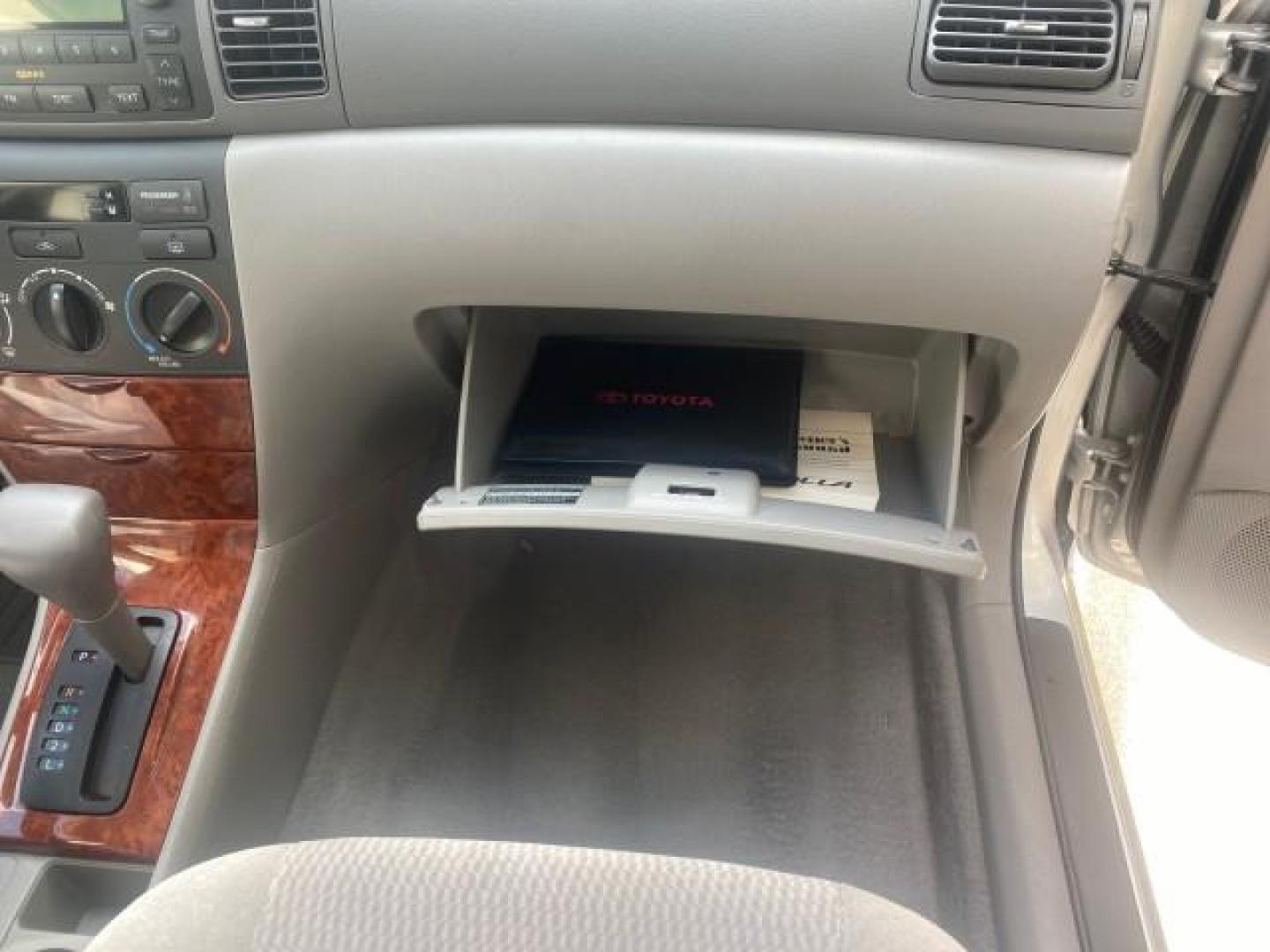 2006 Millenium Silver Metallic /Stone Toyota Corolla LE LOW MILES 23,038 LOADED (1NXBR30E16Z) with an 1.8L DOHC SEFI 16-Valve 4-Cyl Aluminum Engine engine, Automatic transmission, located at 4701 North Dixie Hwy, Pompano Beach, FL, 33064, (954) 422-2889, 26.240938, -80.123474 - OUR WEBPAGE FLORIDACARS1.COM HAS OVER 100 PHOTOS AND FREE CARFAX LINK 2006 TOYOTA COROLLA LE AUTO AC LOADED VIN: 1NXBR30E16Z662050 1 N X B R 3 0 E 1 6 Z 6 6 2 0 5 0 SEDAN 4 DR 1.8L I4 F DOHC 16V 41 MPG GASOLINE FRONT WHEEL DRIVE Top Features Cloth Seats Basic Features AM/FM Stereo CD Audio Power Mir - Photo#90