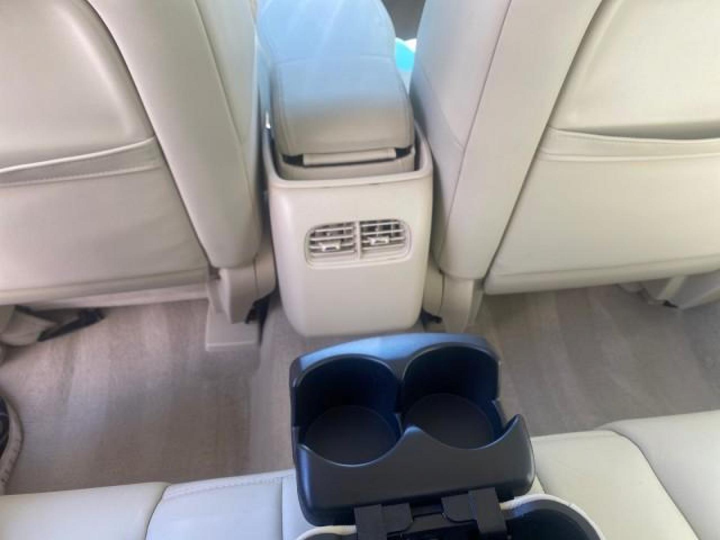 2008 White Diamond Tricoat /Light Linen Cadillac DTS 1 OWNER LOW MILES 25,325 (1G6KD57Y28U) with an Northstar 4.6L DOHC V8 Engine engine, Automatic transmission, located at 4701 North Dixie Hwy, Pompano Beach, FL, 33064, (954) 422-2889, 26.240938, -80.123474 - OUR WEBPAGE FLORIDACARS1.COM HAS OVER 100 PHOTOS AND FREE CARFAX LINK 2008 CADILLAC DTS VIN: 1G6KD57Y28U201203 1 G 6 K D 5 7 Y 2 8 U 2 0 1 2 0 3 SEDAN 4 DR 4.6L V8 F GASOLINE FRONT WHEEL DRIVE Top Features A/C Seat(s) Leather Seats Alloy Wheels Memory Seat(s) BOSE Sound System Parking Sensors Blind - Photo#64