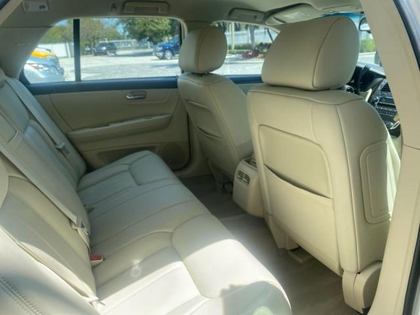 2008 White Diamond Tricoat /Light Linen Cadillac DTS 1 OWNER LOW MILES 25,325 (1G6KD57Y28U) with an Northstar 4.6L DOHC V8 Engine engine, Automatic transmission, located at 4701 North Dixie Hwy, Pompano Beach, FL, 33064, (954) 422-2889, 26.240938, -80.123474 - OUR WEBPAGE FLORIDACARS1.COM HAS OVER 100 PHOTOS AND FREE CARFAX LINK 2008 CADILLAC DTS VIN: 1G6KD57Y28U201203 1 G 6 K D 5 7 Y 2 8 U 2 0 1 2 0 3 SEDAN 4 DR 4.6L V8 F GASOLINE FRONT WHEEL DRIVE Top Features A/C Seat(s) Leather Seats Alloy Wheels Memory Seat(s) BOSE Sound System Parking Sensors Blind - Photo#86
