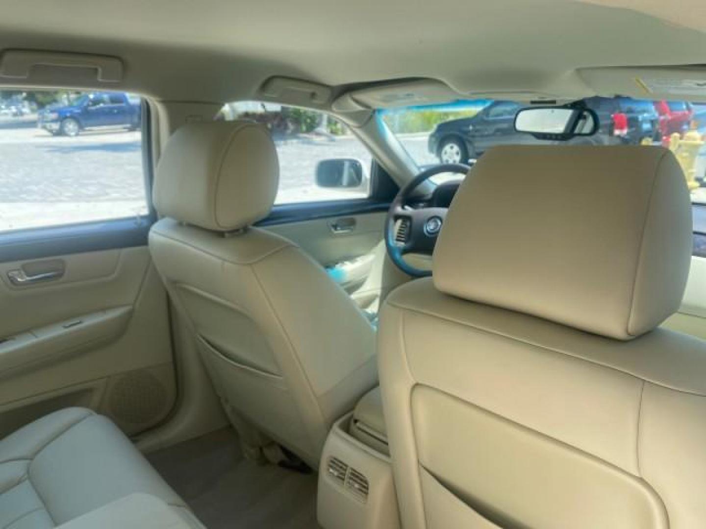 2008 White Diamond Tricoat /Light Linen Cadillac DTS 1 OWNER LOW MILES 25,325 (1G6KD57Y28U) with an Northstar 4.6L DOHC V8 Engine engine, Automatic transmission, located at 4701 North Dixie Hwy, Pompano Beach, FL, 33064, (954) 422-2889, 26.240938, -80.123474 - OUR WEBPAGE FLORIDACARS1.COM HAS OVER 100 PHOTOS AND FREE CARFAX LINK 2008 CADILLAC DTS VIN: 1G6KD57Y28U201203 1 G 6 K D 5 7 Y 2 8 U 2 0 1 2 0 3 SEDAN 4 DR 4.6L V8 F GASOLINE FRONT WHEEL DRIVE Top Features A/C Seat(s) Leather Seats Alloy Wheels Memory Seat(s) BOSE Sound System Parking Sensors Blind - Photo#89